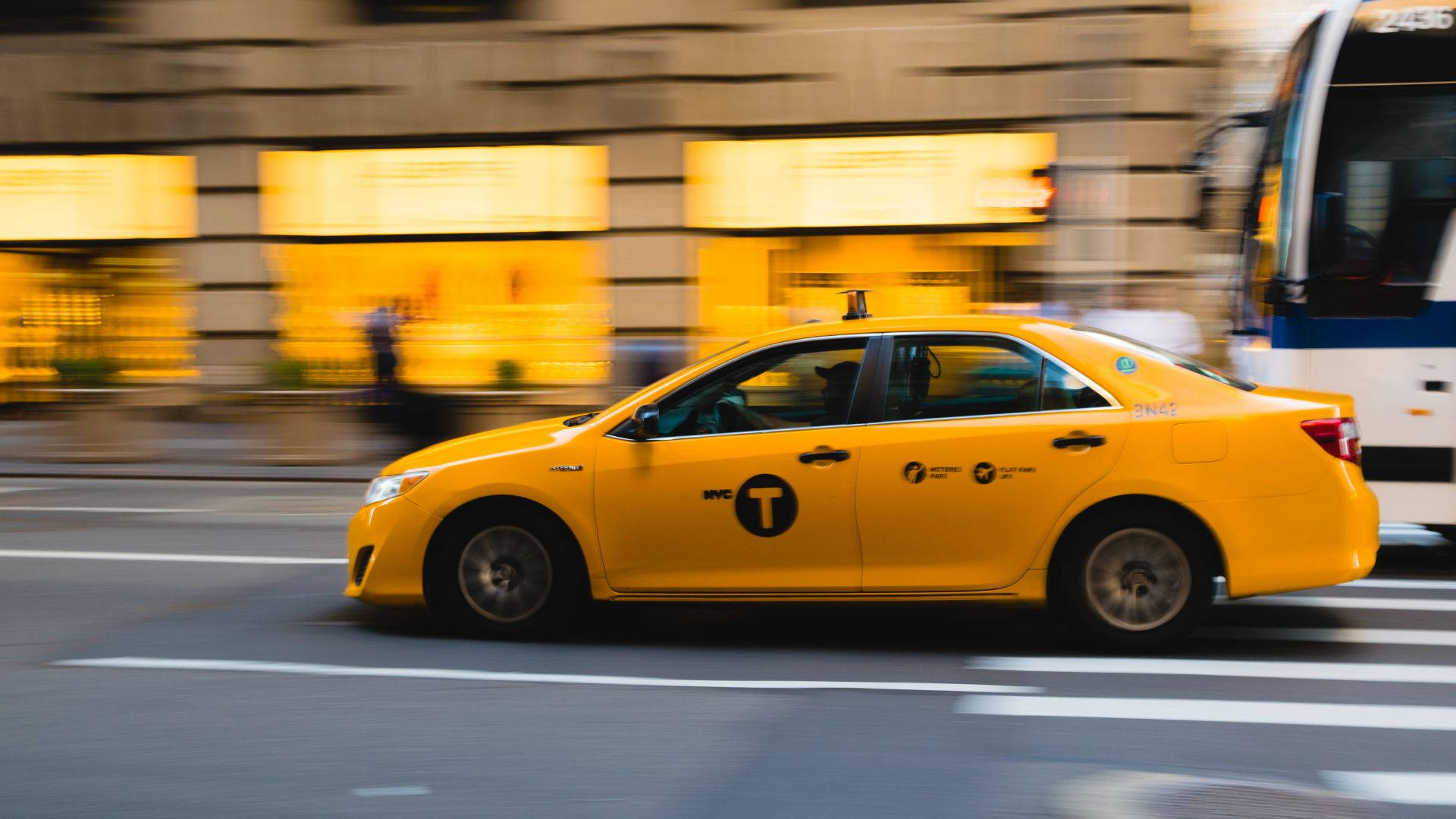 Yellow Taxi Cab Motion Blur Background