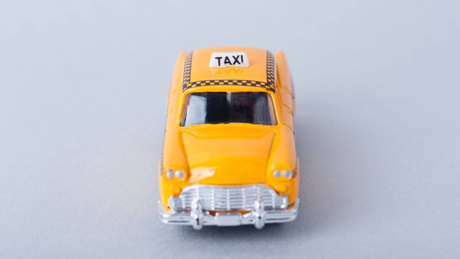 Yellow Taxi Toy Car Background