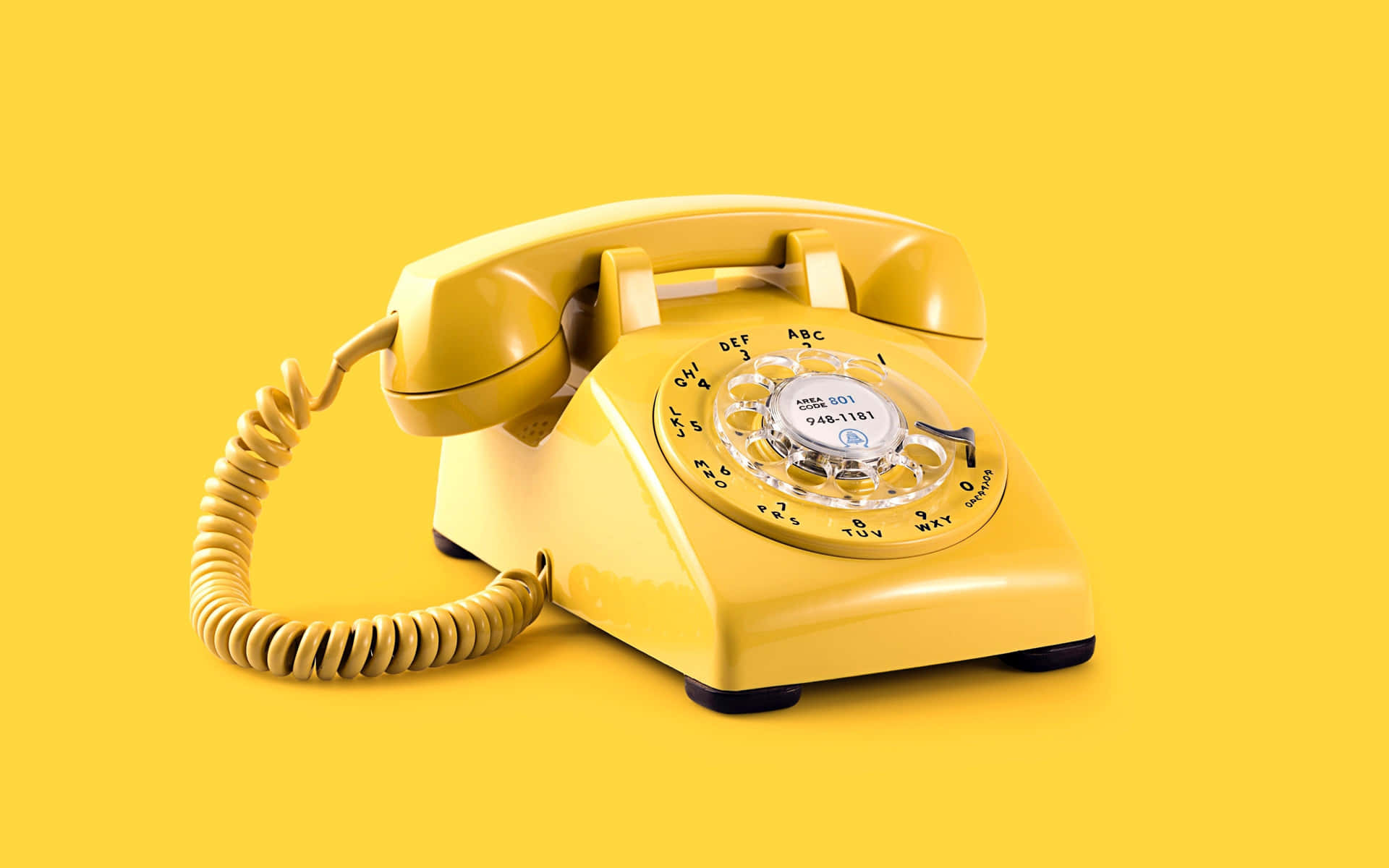 Yellow Telephone On A Yellow Background Background