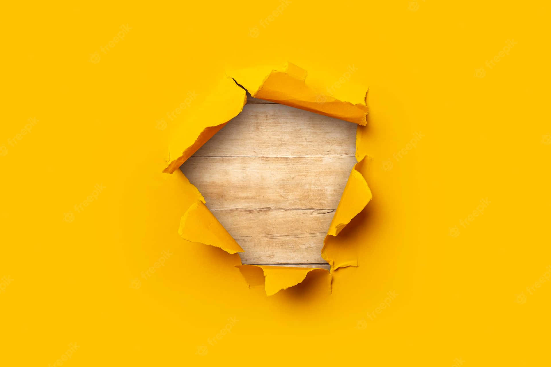 Yellow Torn Paper On Wood Background