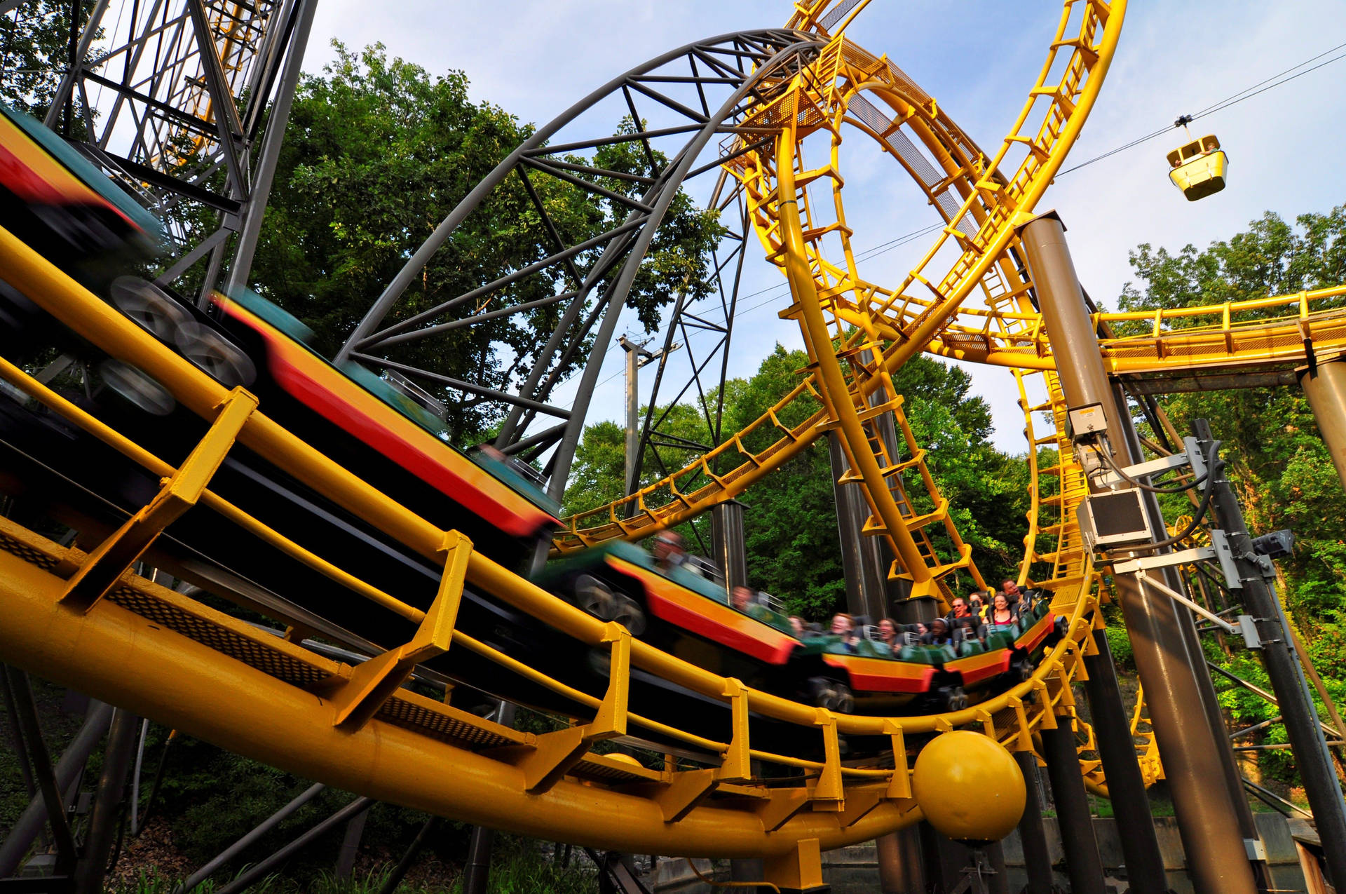 Yellow Tracks In Theme Park Background