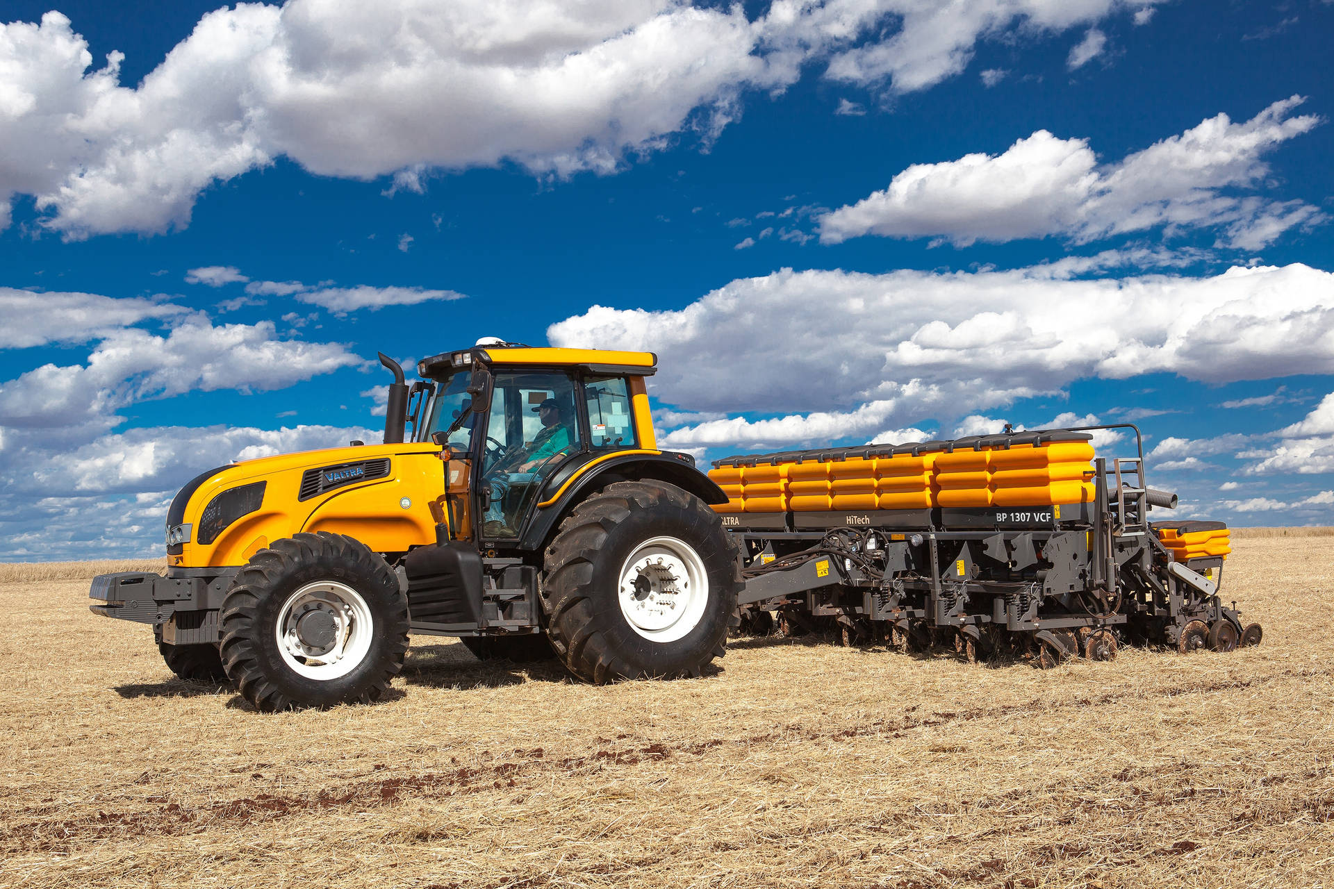 Yellow Valtra Hitech 4 Tractor Background