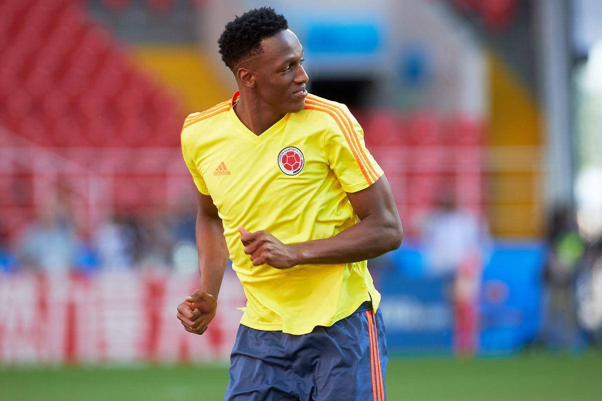 Yerry Mina Looking Over His Shoulder Background