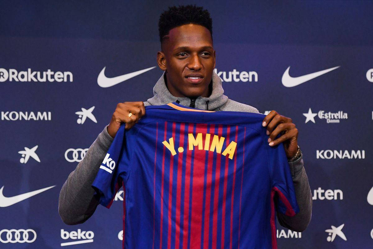 Yerry Mina Posing With Jersey Background