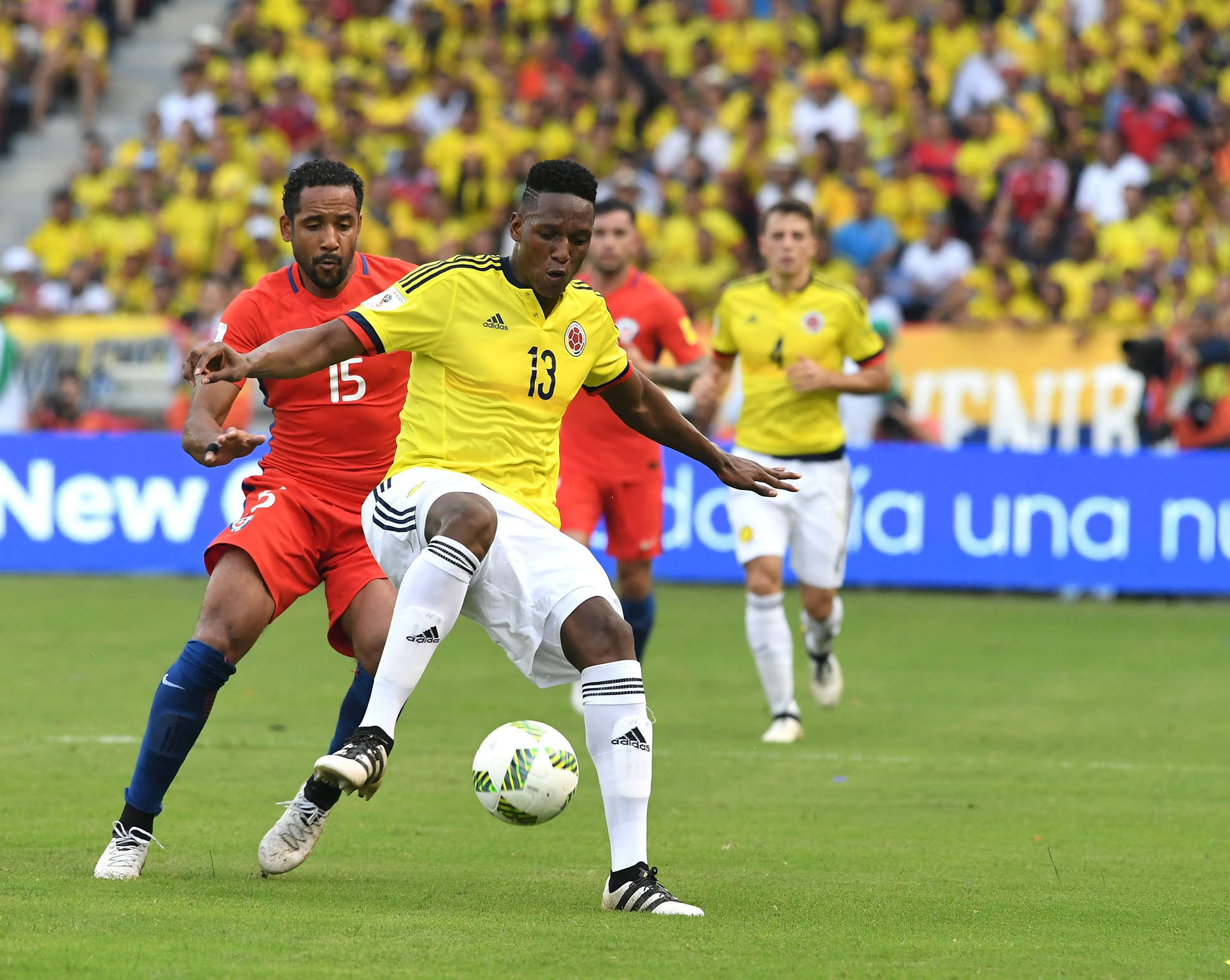 Yerry Mina With The Ball Background