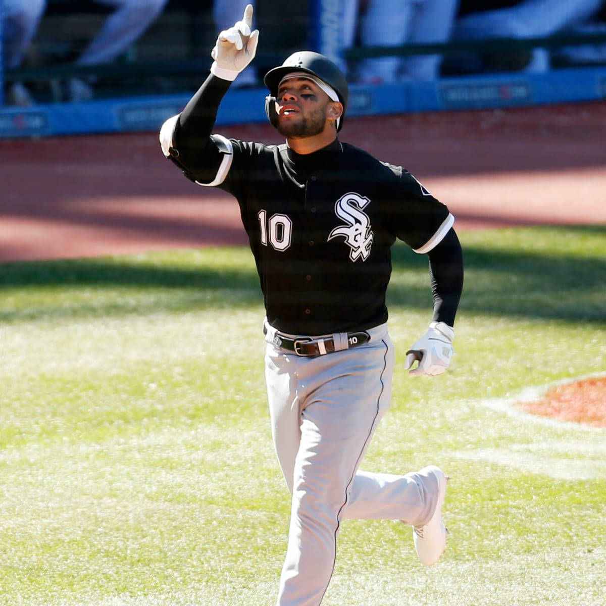 Yoan Moncada Running And Pointing Up Background