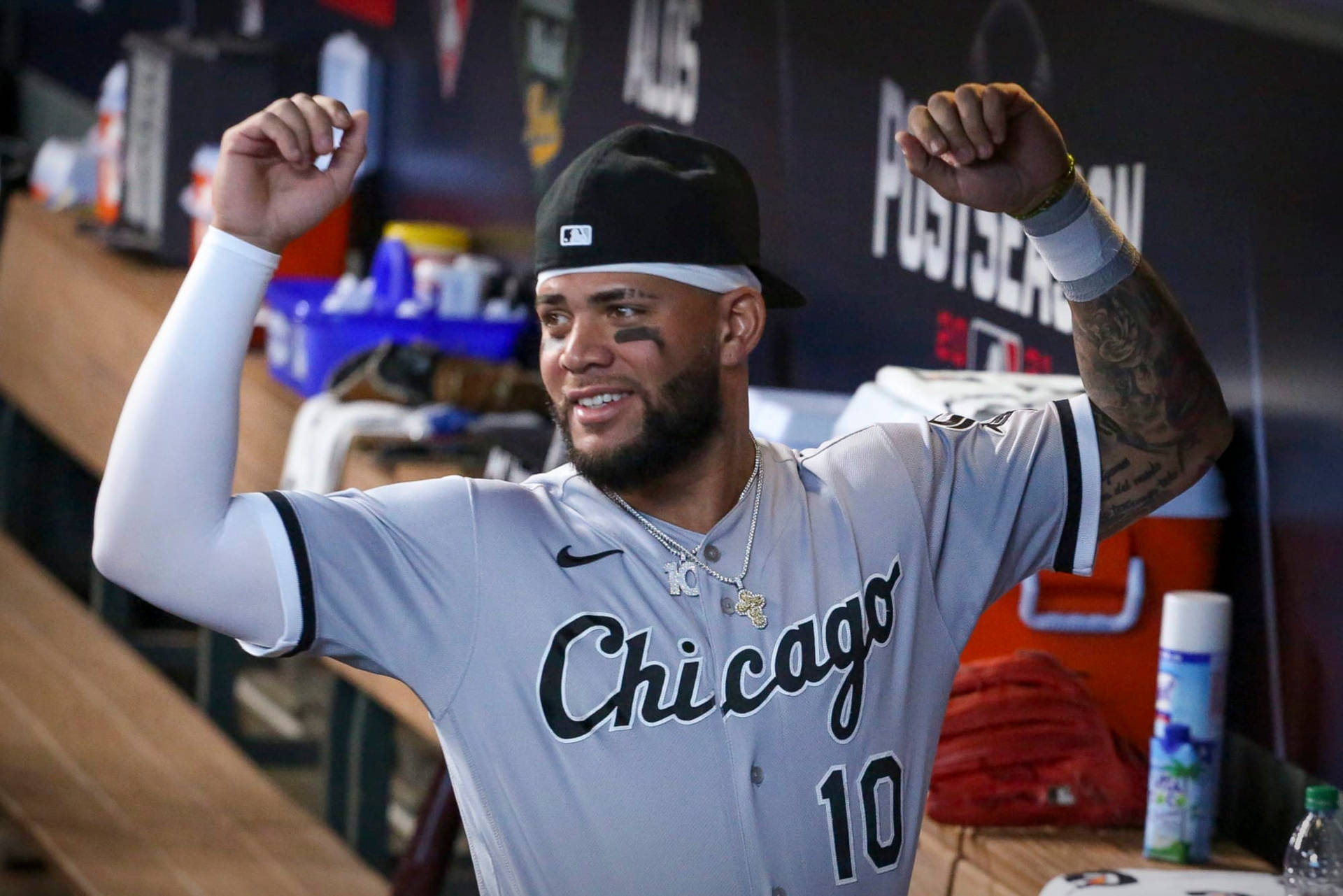 Yoan Moncada Smiling With Arms Up Background