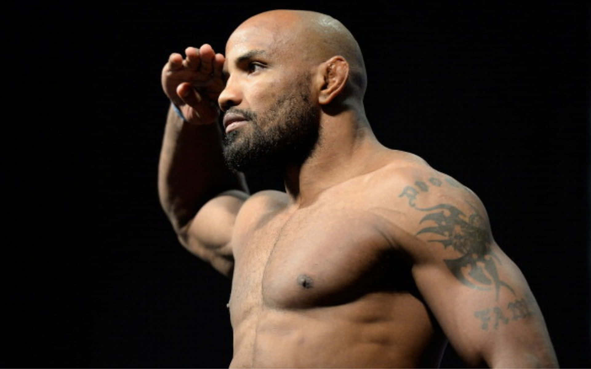 Yoel Romero Saluting Side Angle Shot Background