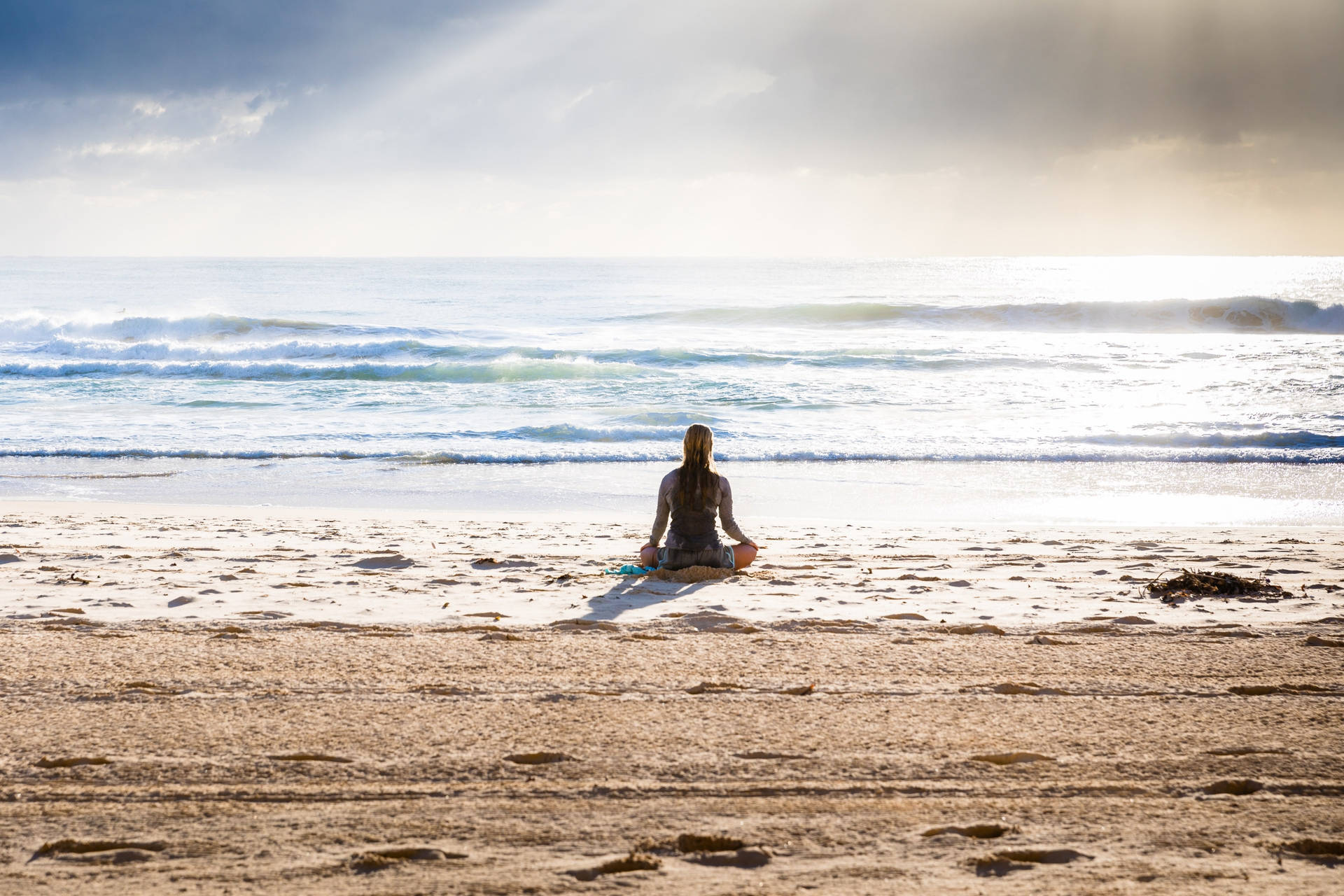 Yoga And Meditation Therapy By The Beach Background