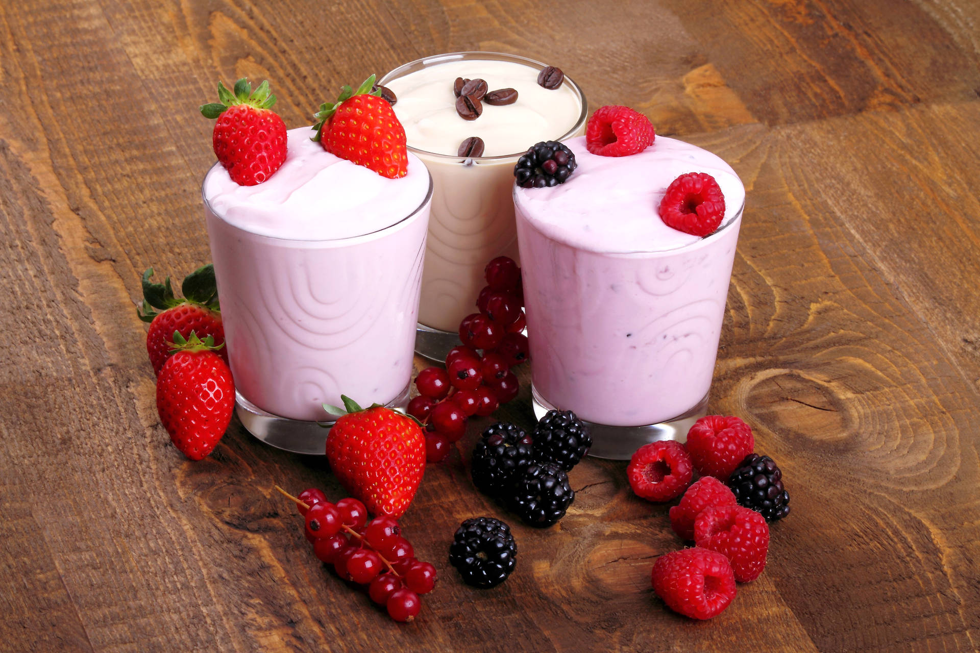 Yogurt With Berries And Coffee Beans Background