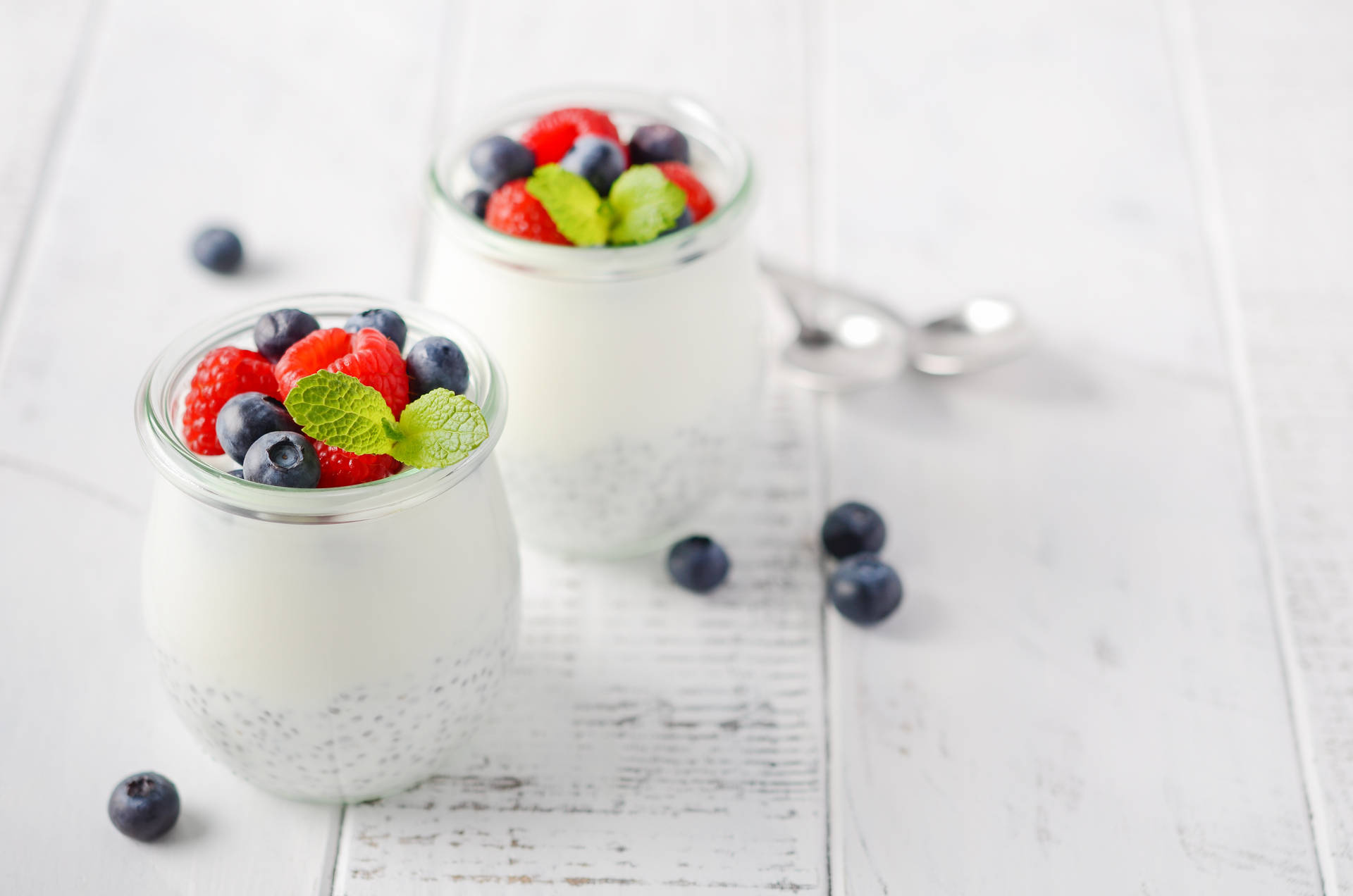 Yogurt With Berry Fruits Background