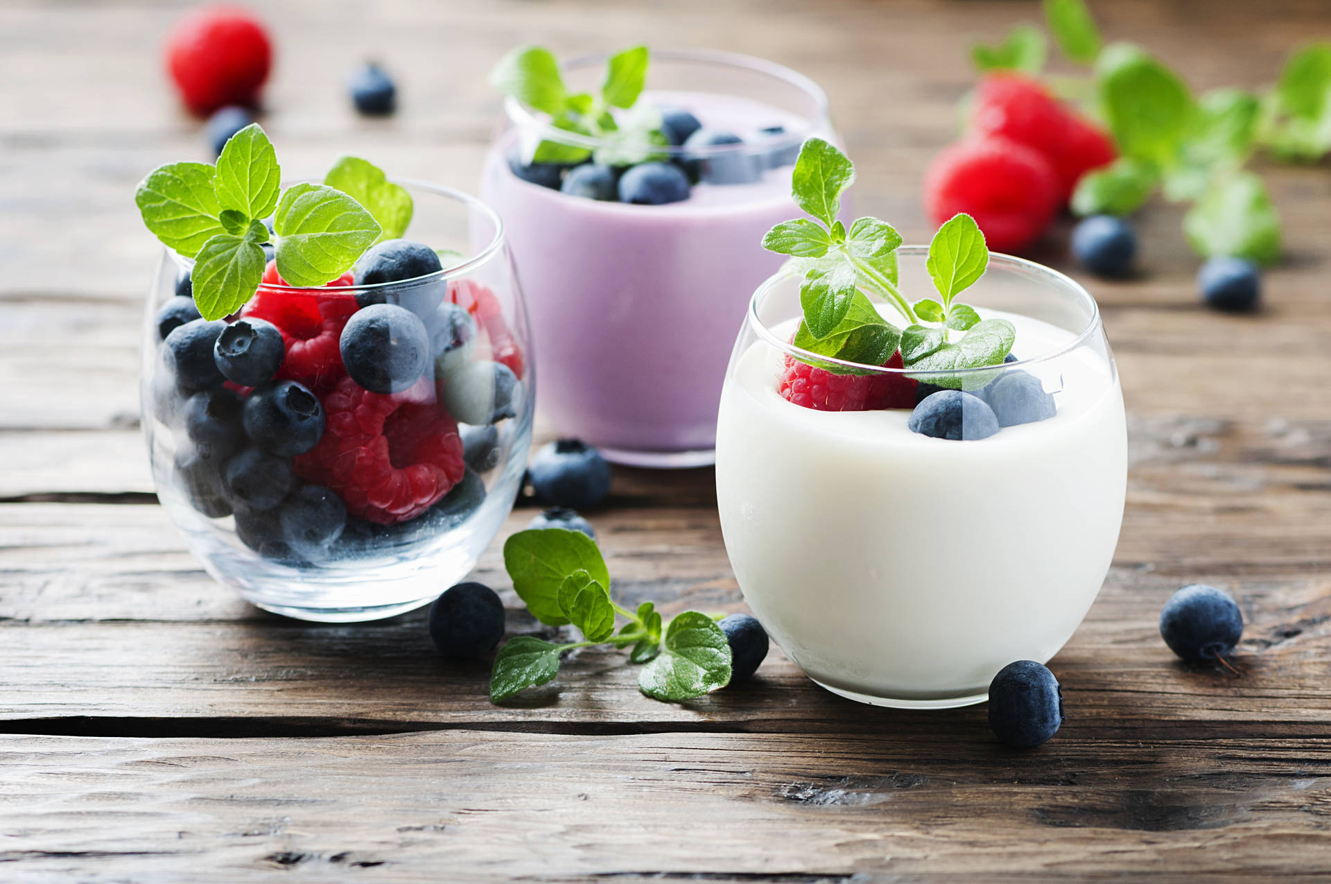 Yogurt With Blueberries And Mint Background