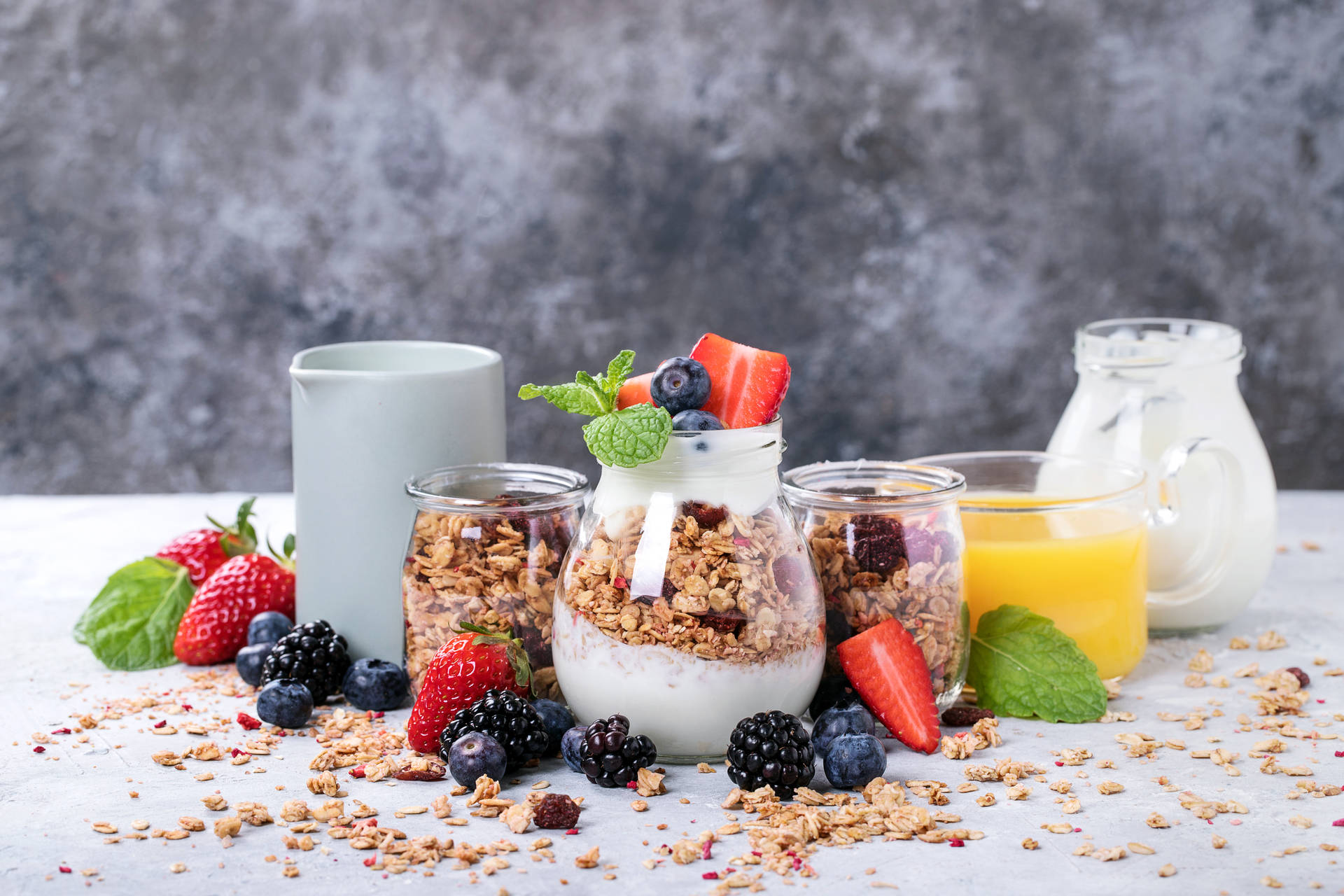 Yogurt With Granola And Fruit Juice Background