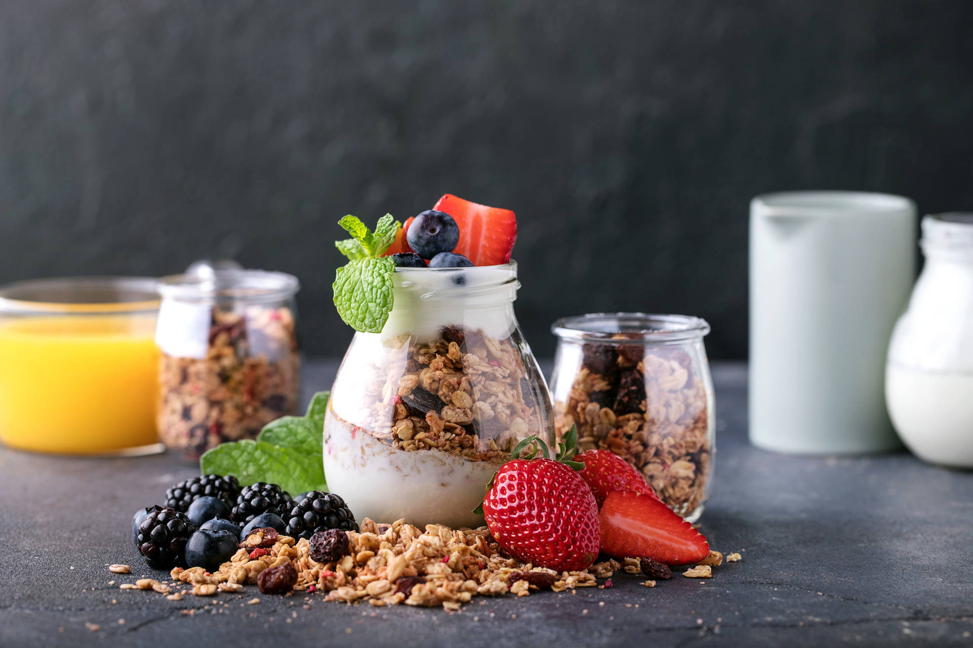 Yogurt With Granola And Fruits Background