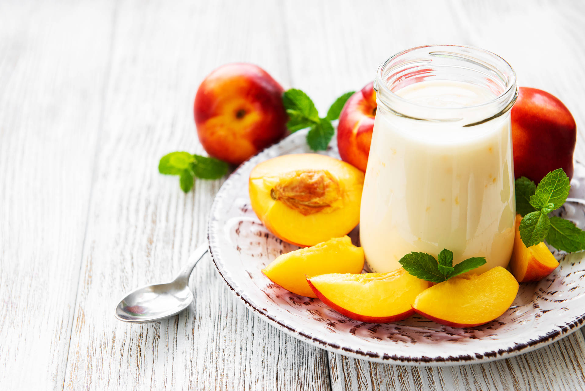 Yogurt With Peach And Apples Background