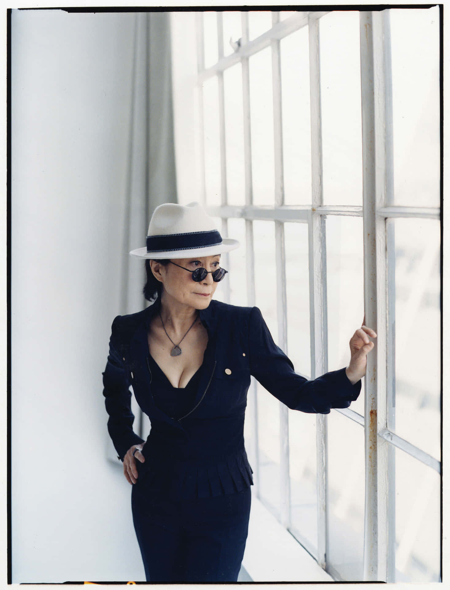 Yoko Ono By Window Background