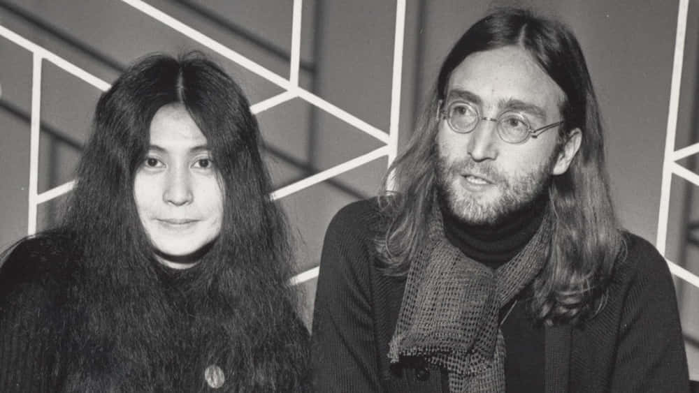 Yoko Ono Looking At Camera Background