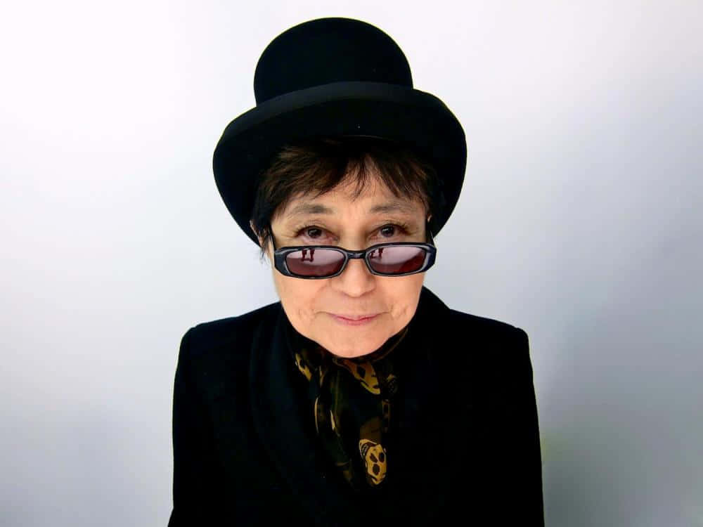 Yoko Ono Tall Black Hat Background