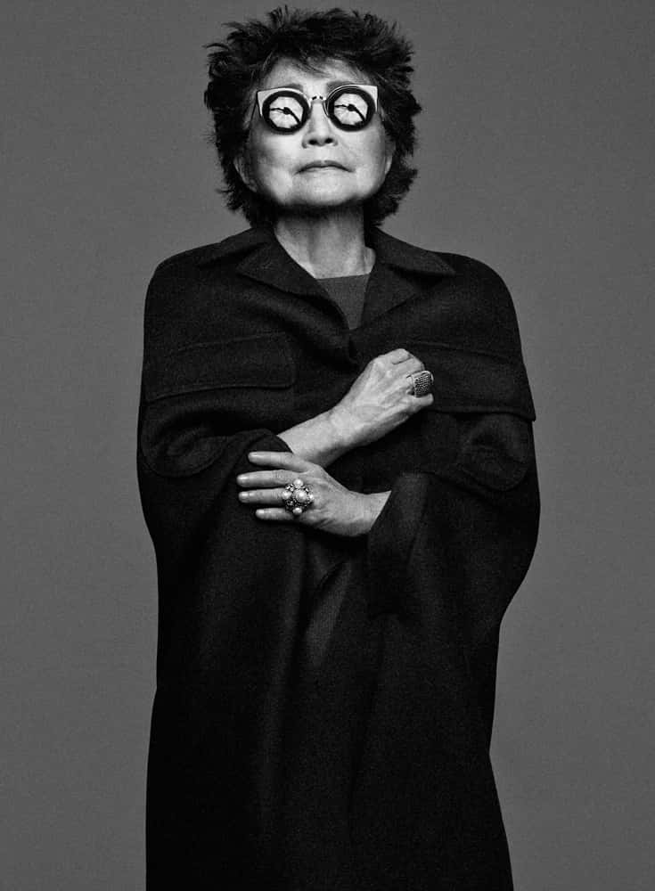 Yoko Ono Wearing Fun And Quirky Glasses Background