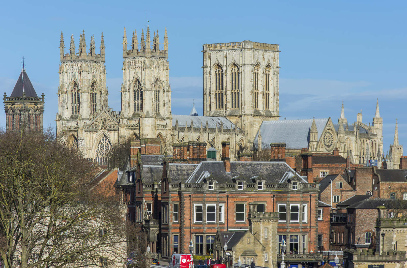 York Minster Cathedral Behind Buildings Background