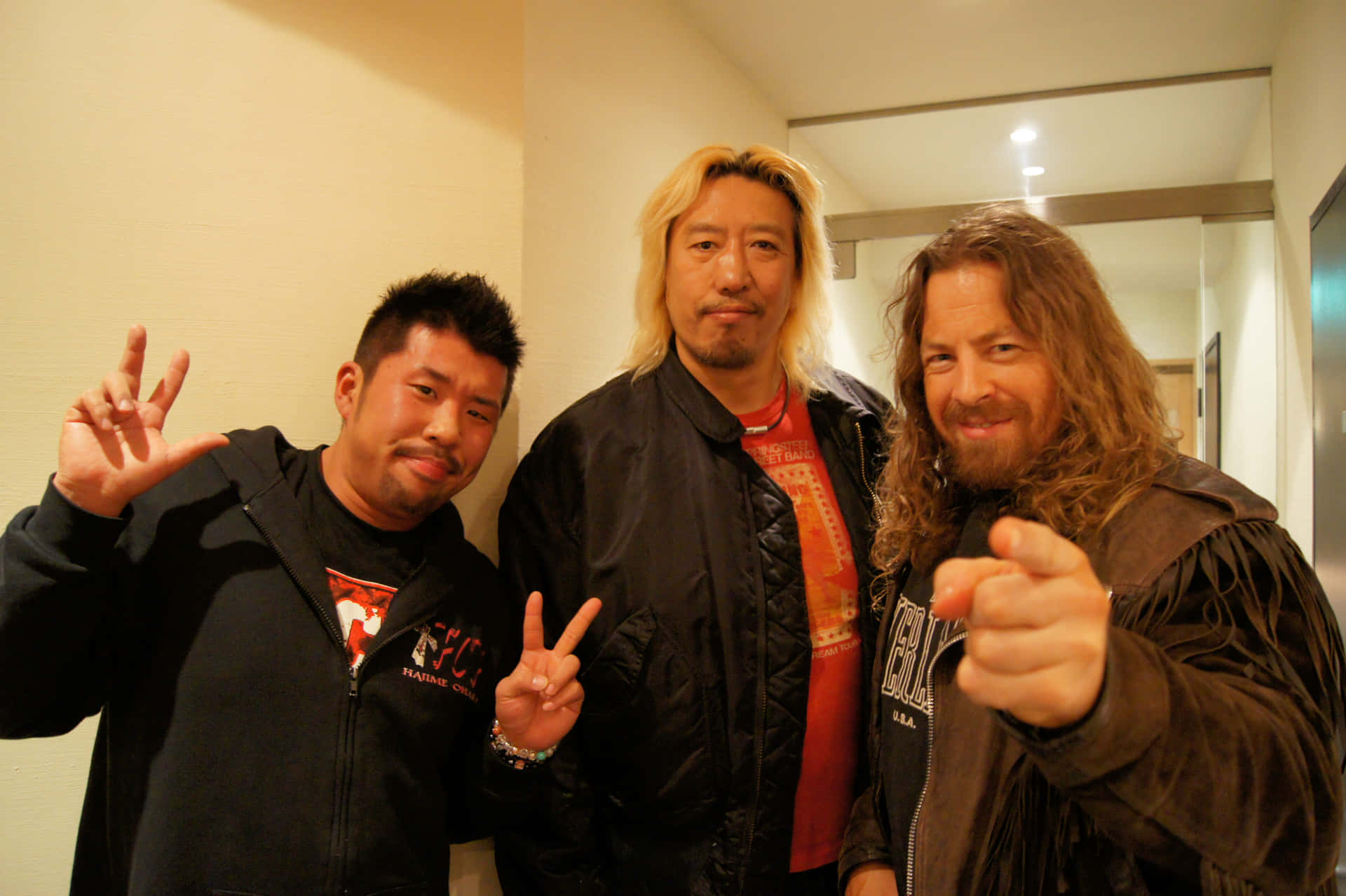 Yoshihiro Takayama With Other Wrestler Background