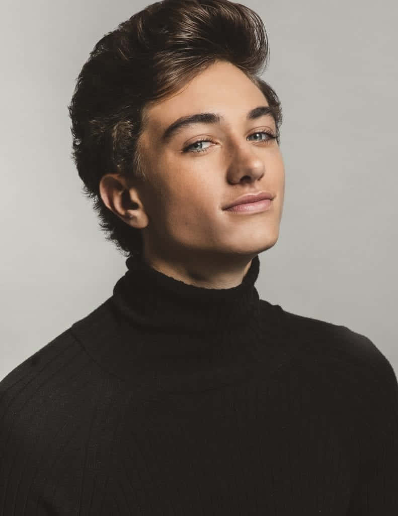 Young Actorin Black Turtleneck Background