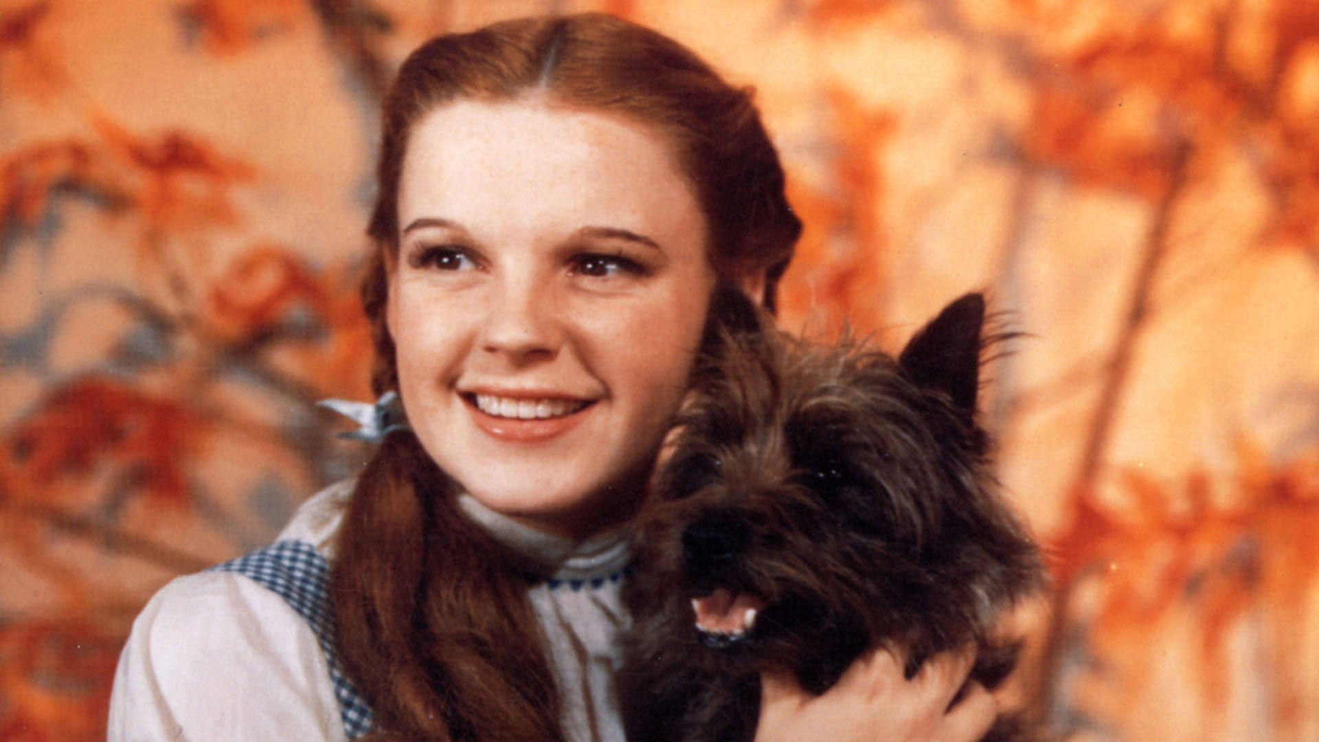 Young Actress Judy Garland With Dog Background