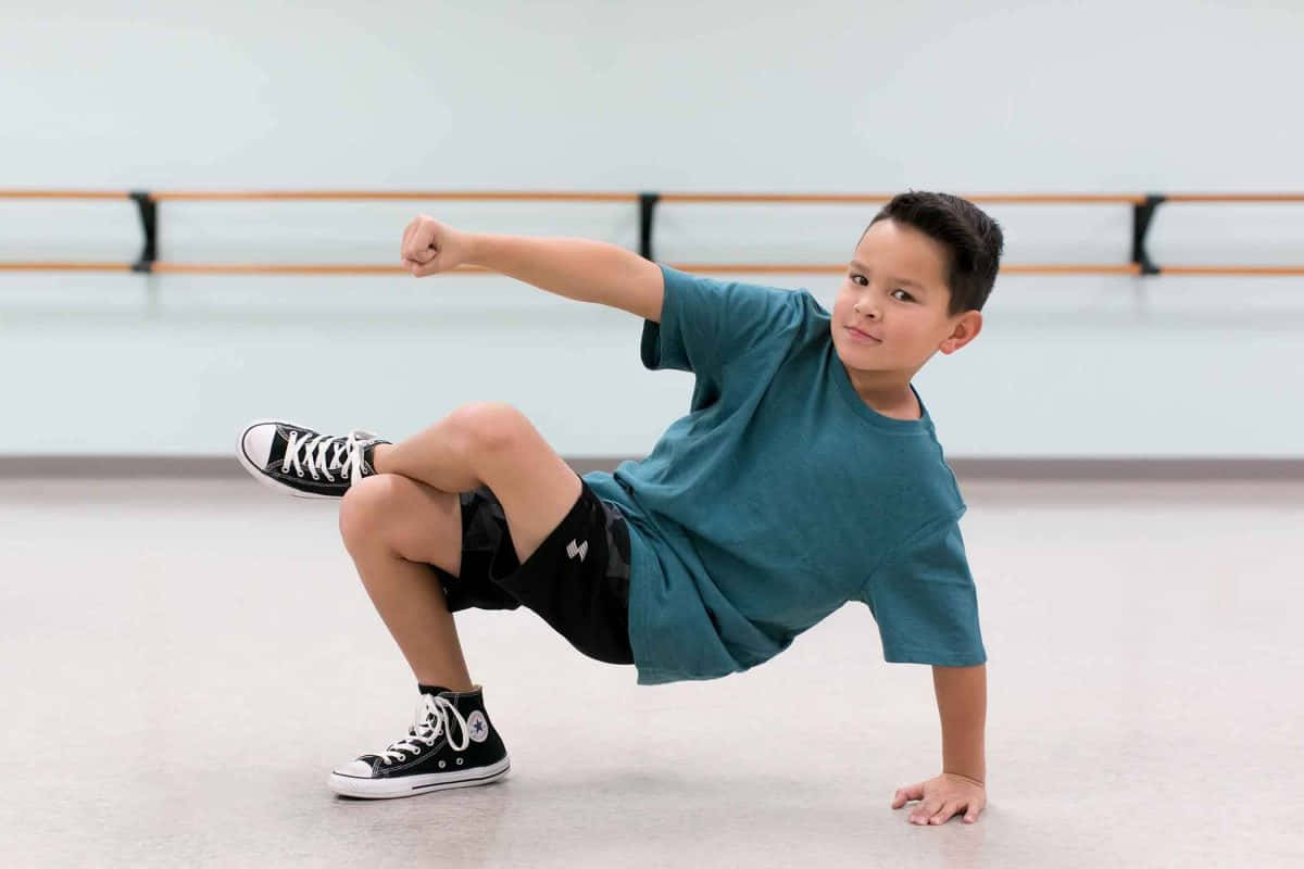 Young_ Boy_ Hip_ Hop_ Dance_ Pose Background