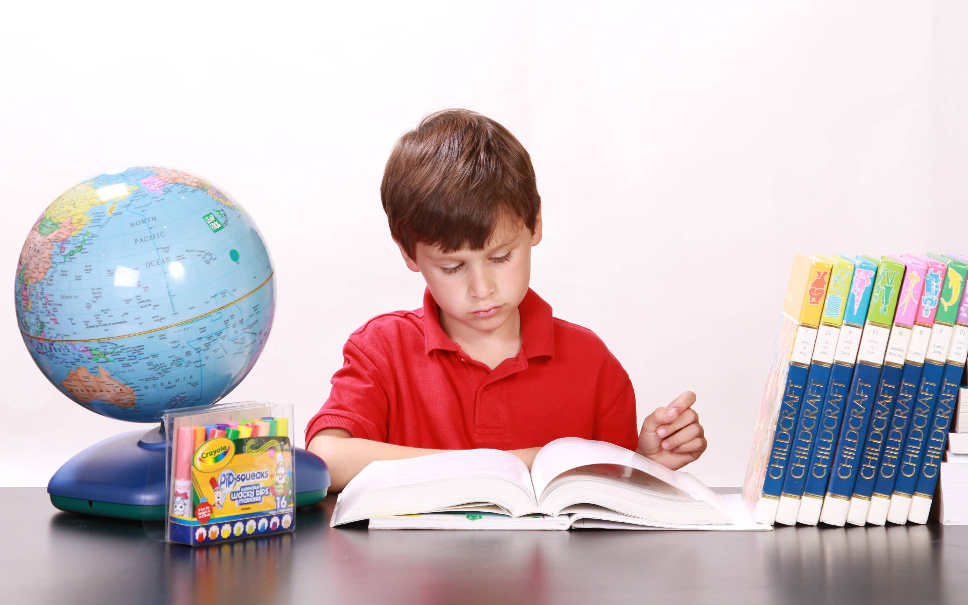 Young Boy Reading Educational Books Background