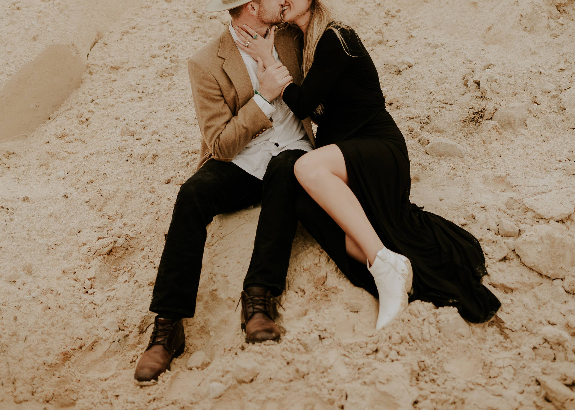 Young Couple In Love Admiring Sunset On A Beach