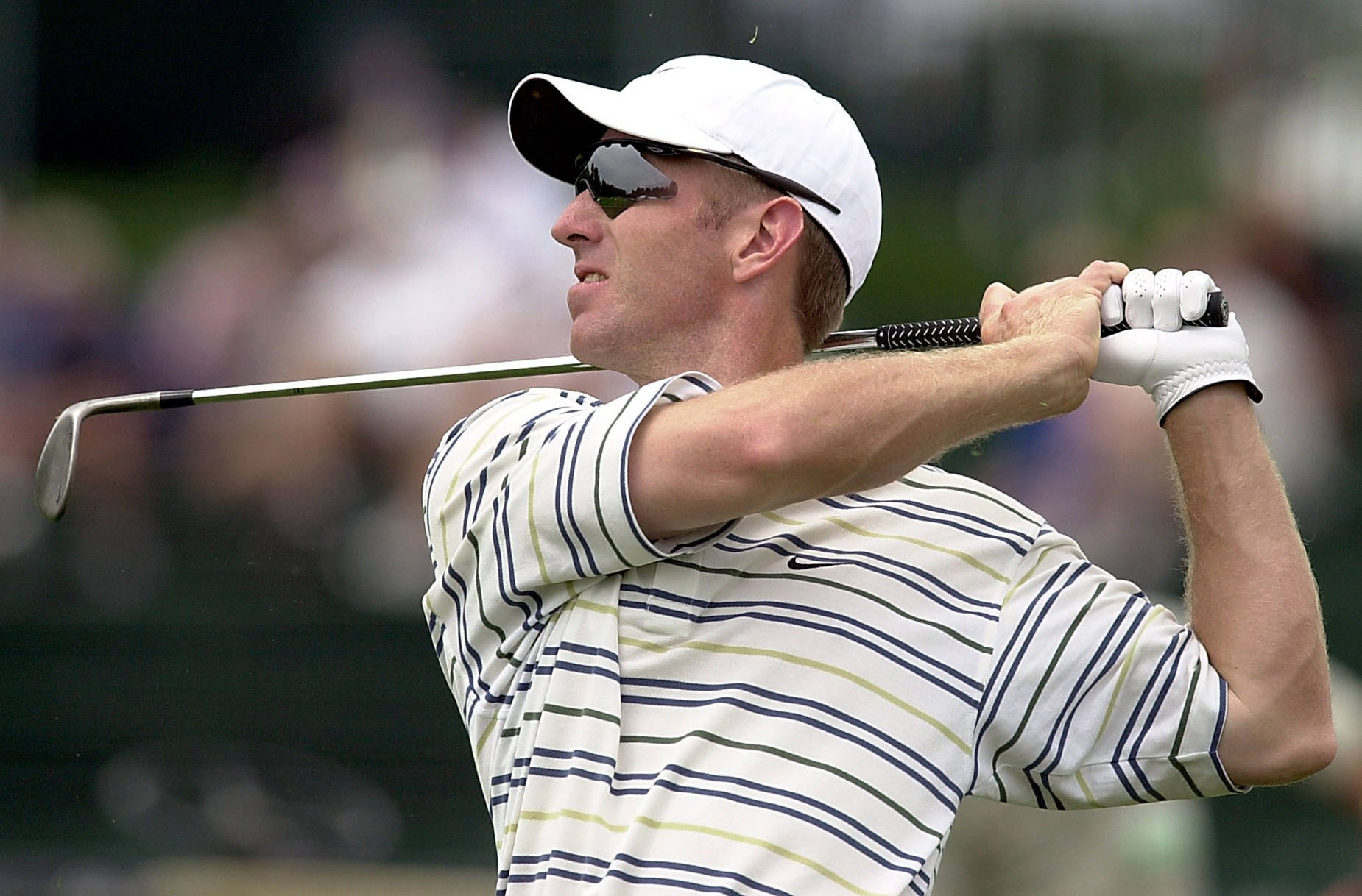 Young David Duval In Striped Shirt Background