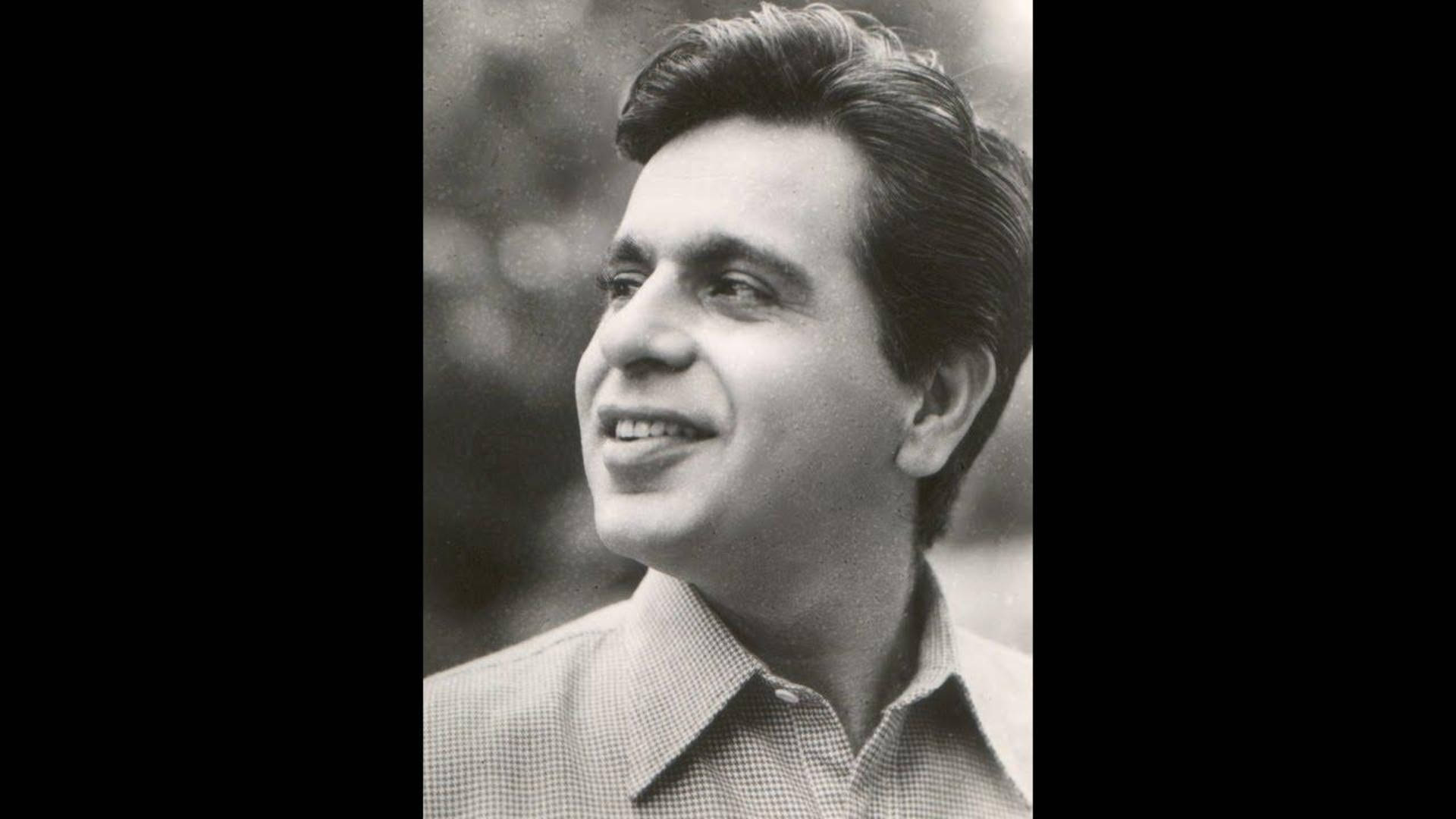 Young Dilip Kumar In Sepia Tone Background