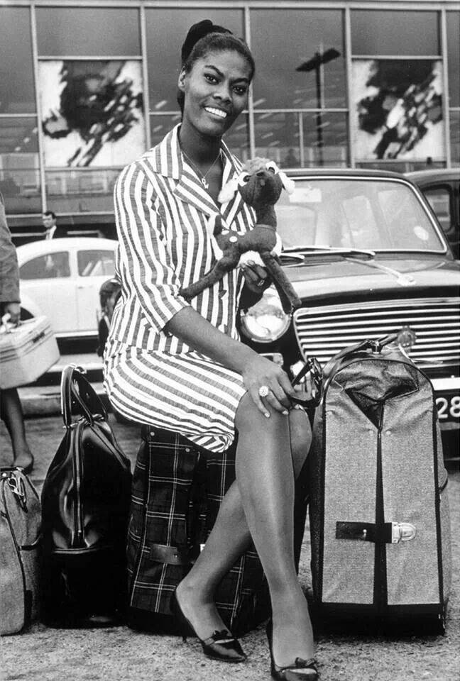 Young Dionne Warwick Luggage Background