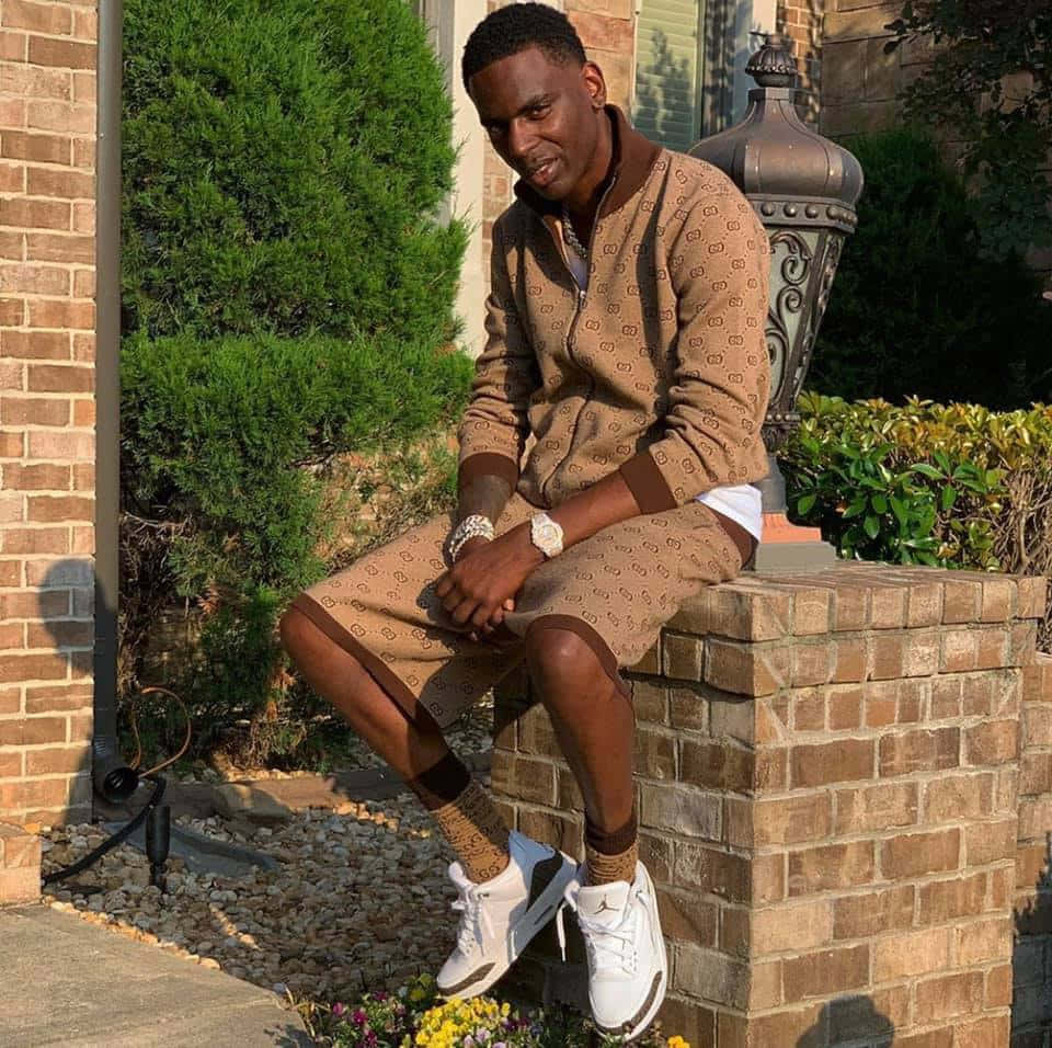 Young Dolph, An American Rapper, Strikes A Pose Background