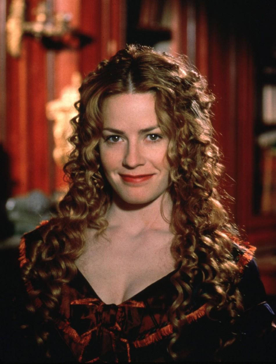 Young Elisabeth Shue With Long Curly Hair Smiling Background