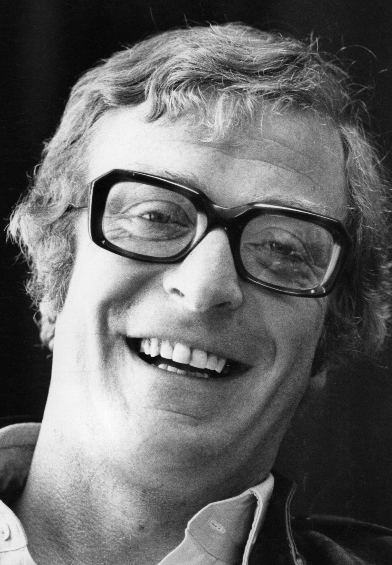 Young English Actor Michael Caine Portrait Shot Background