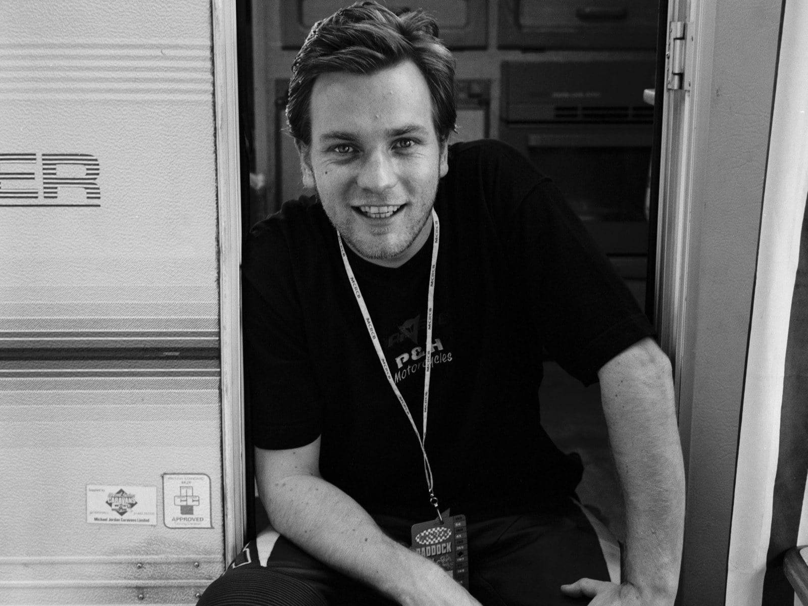 Young Ewan Mcgregor Smile Black And White Background