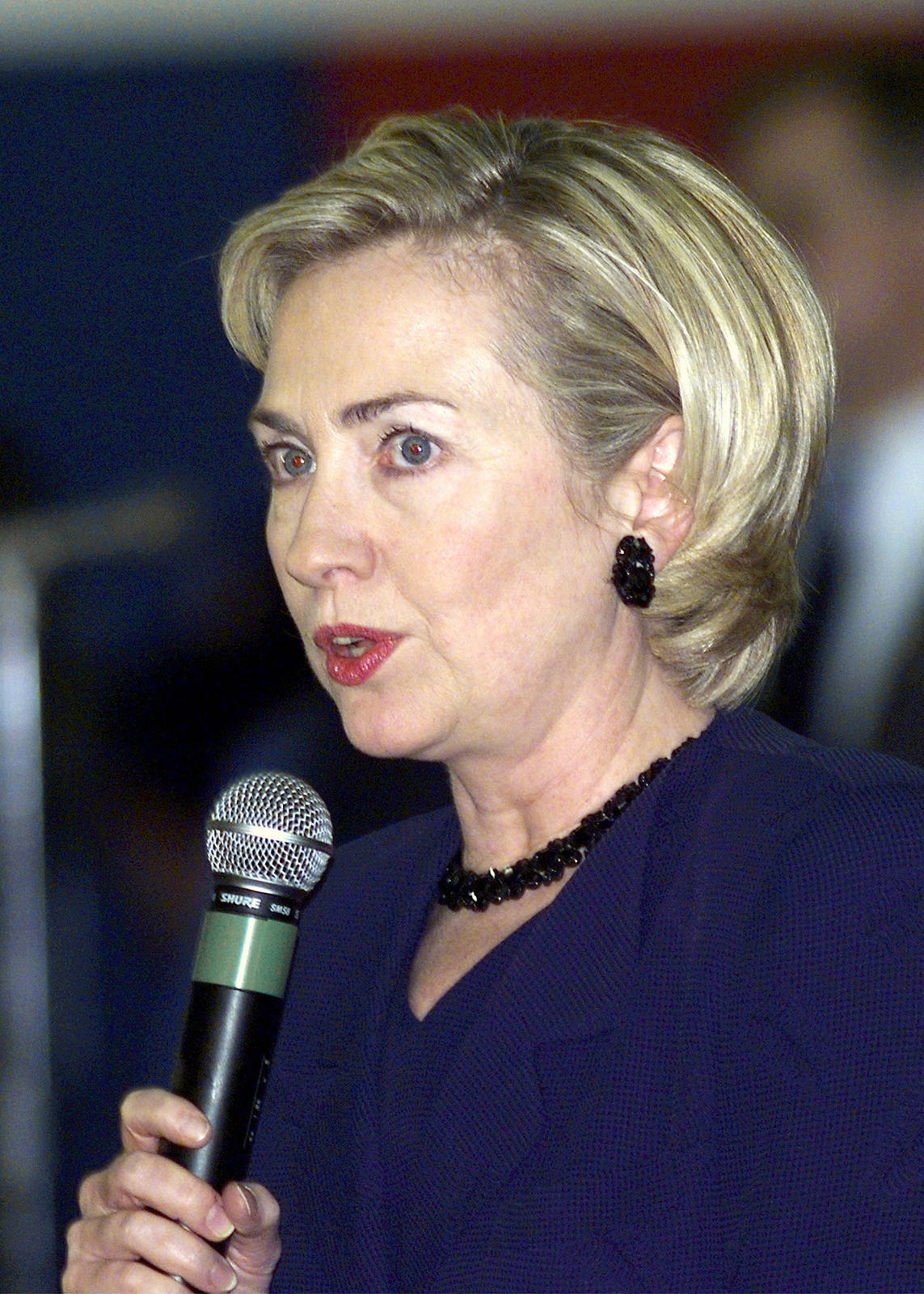 Young Hillary Clinton In A Thoughtful Pose Background