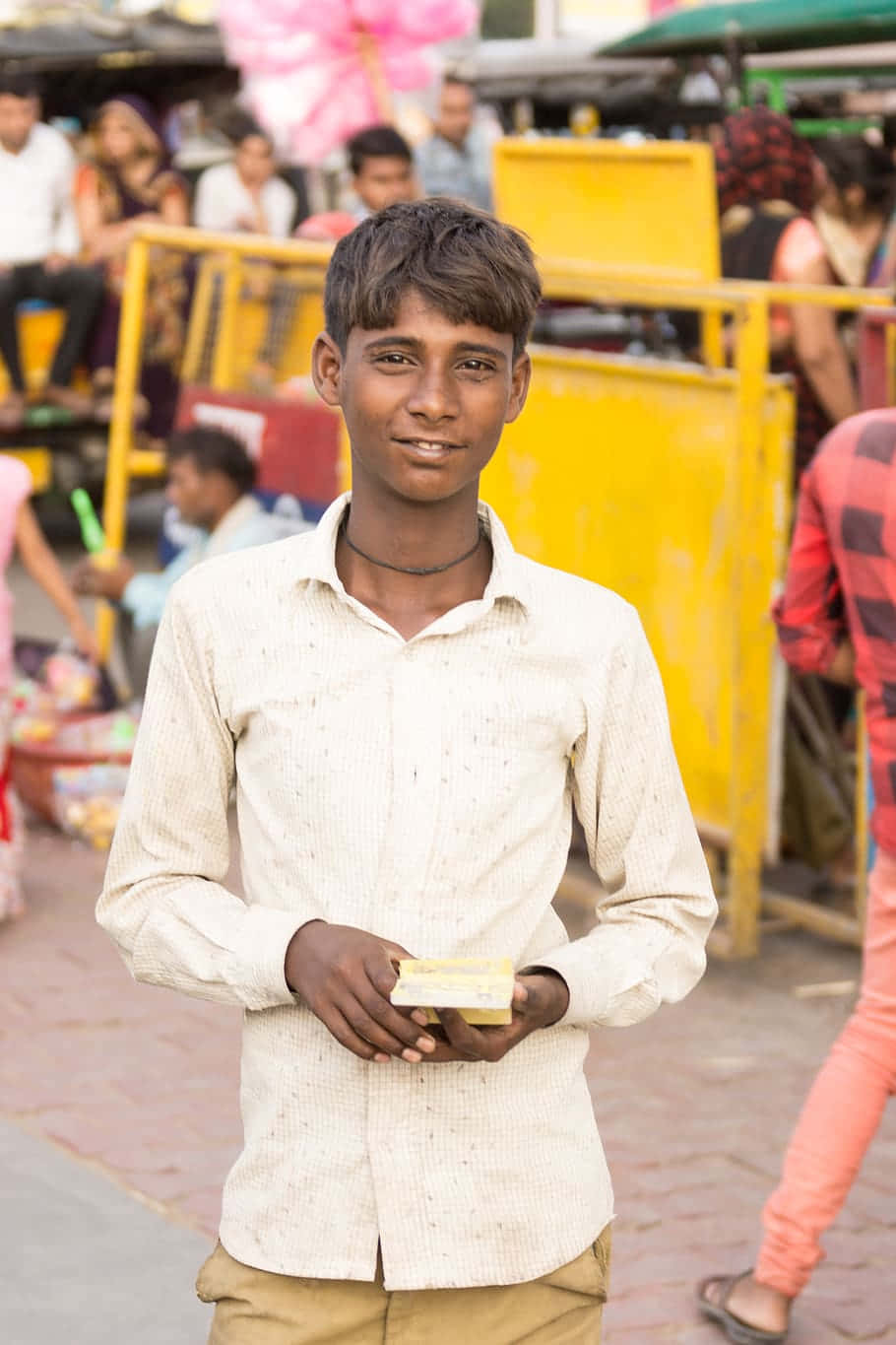 Young Indian Guy In The Streets Background