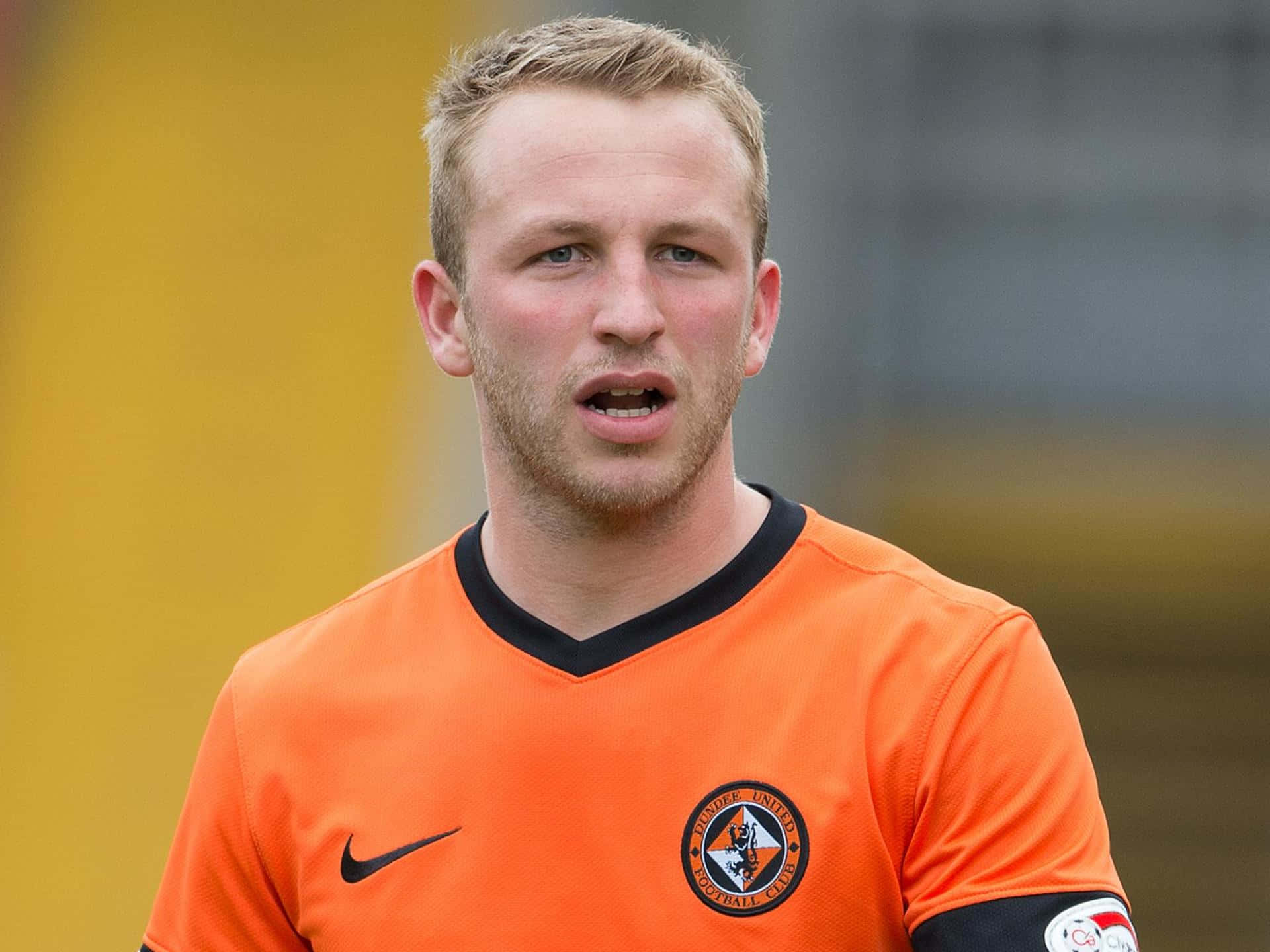 Young John Russell For Dundee United Football Club Background