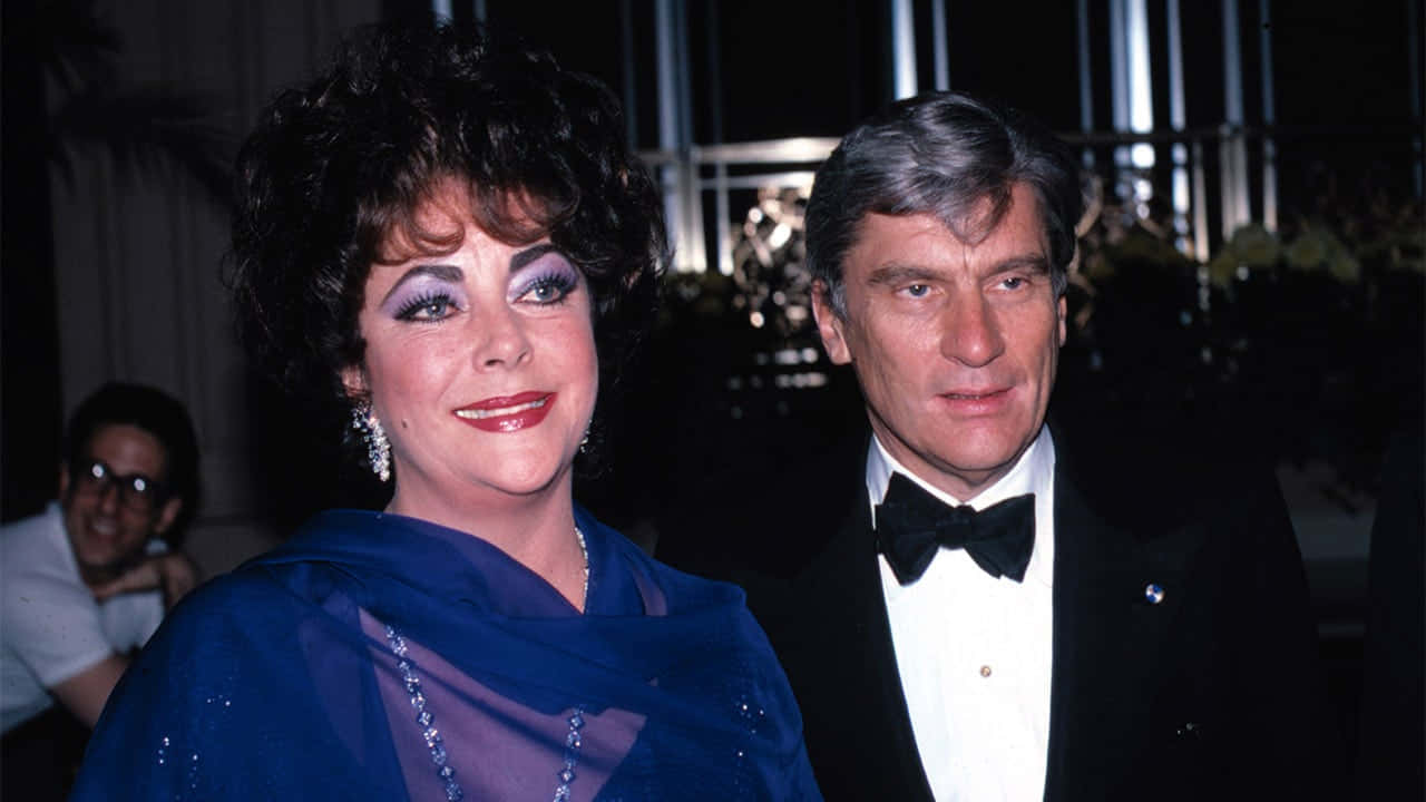 Young John Warner And Elizabeth Taylor Background