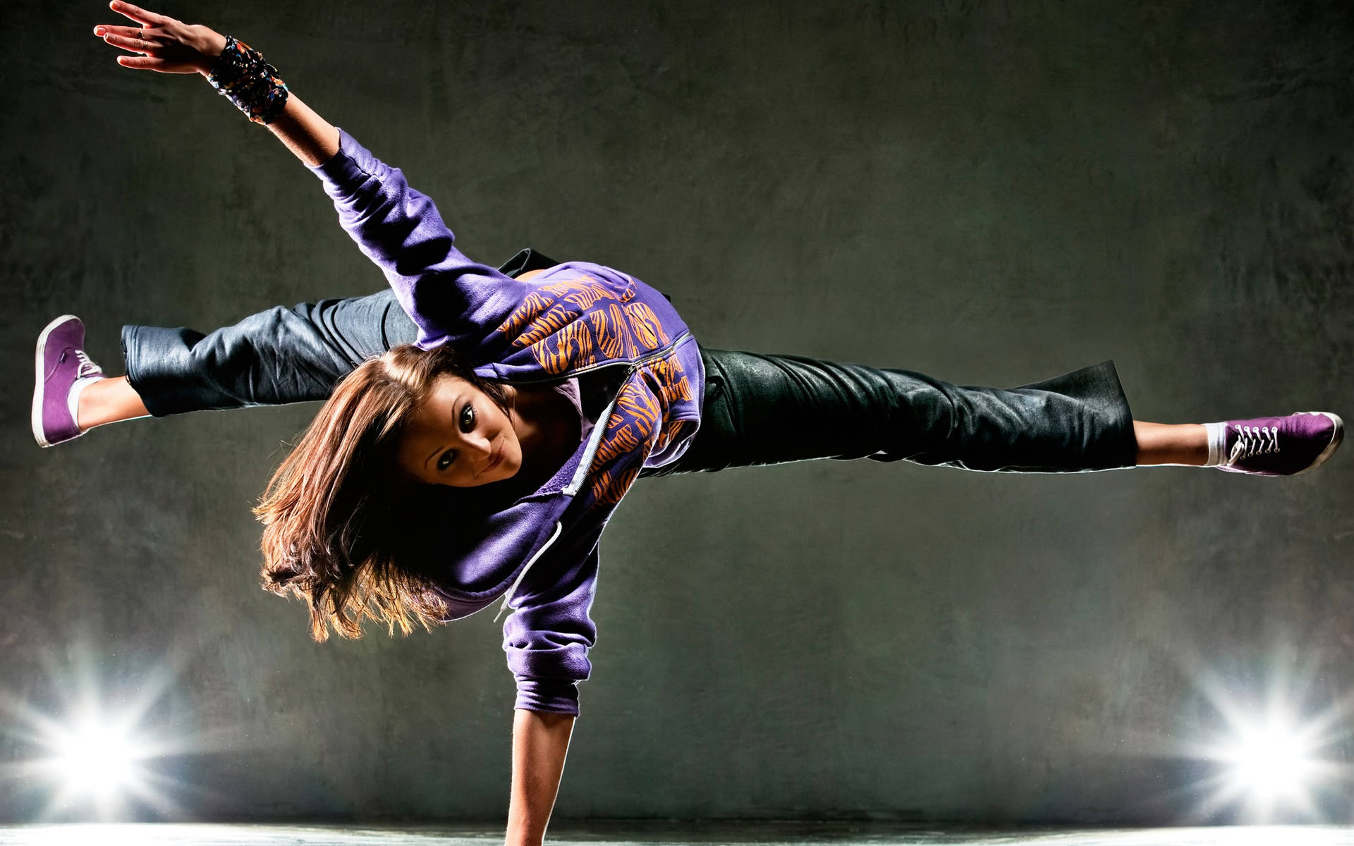 Young Lady Upside Down Dance Pose Background