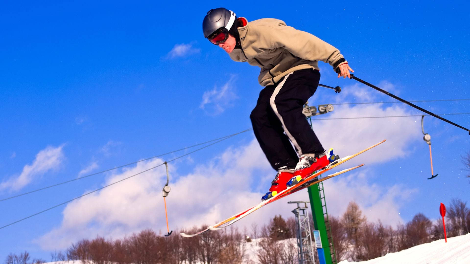 Young Man Ski Jumping Position Background