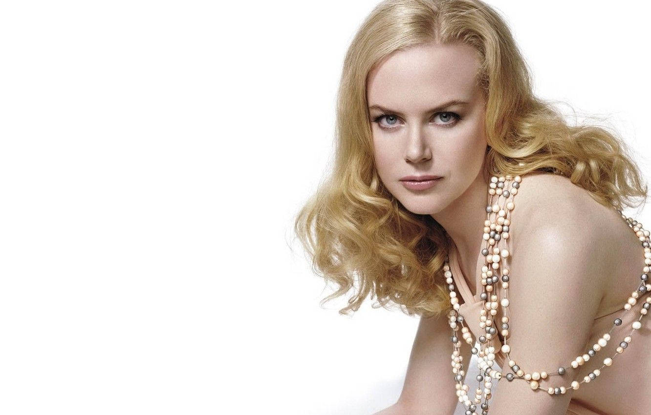 Young Nicole Kidman Wearing Pearls Background