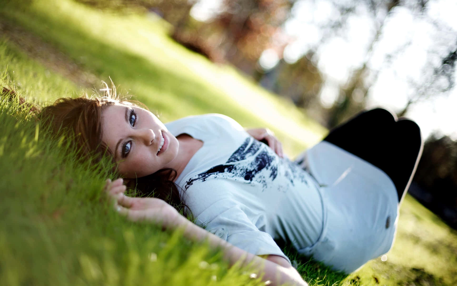 Young Teenage Girl On The Ground Background