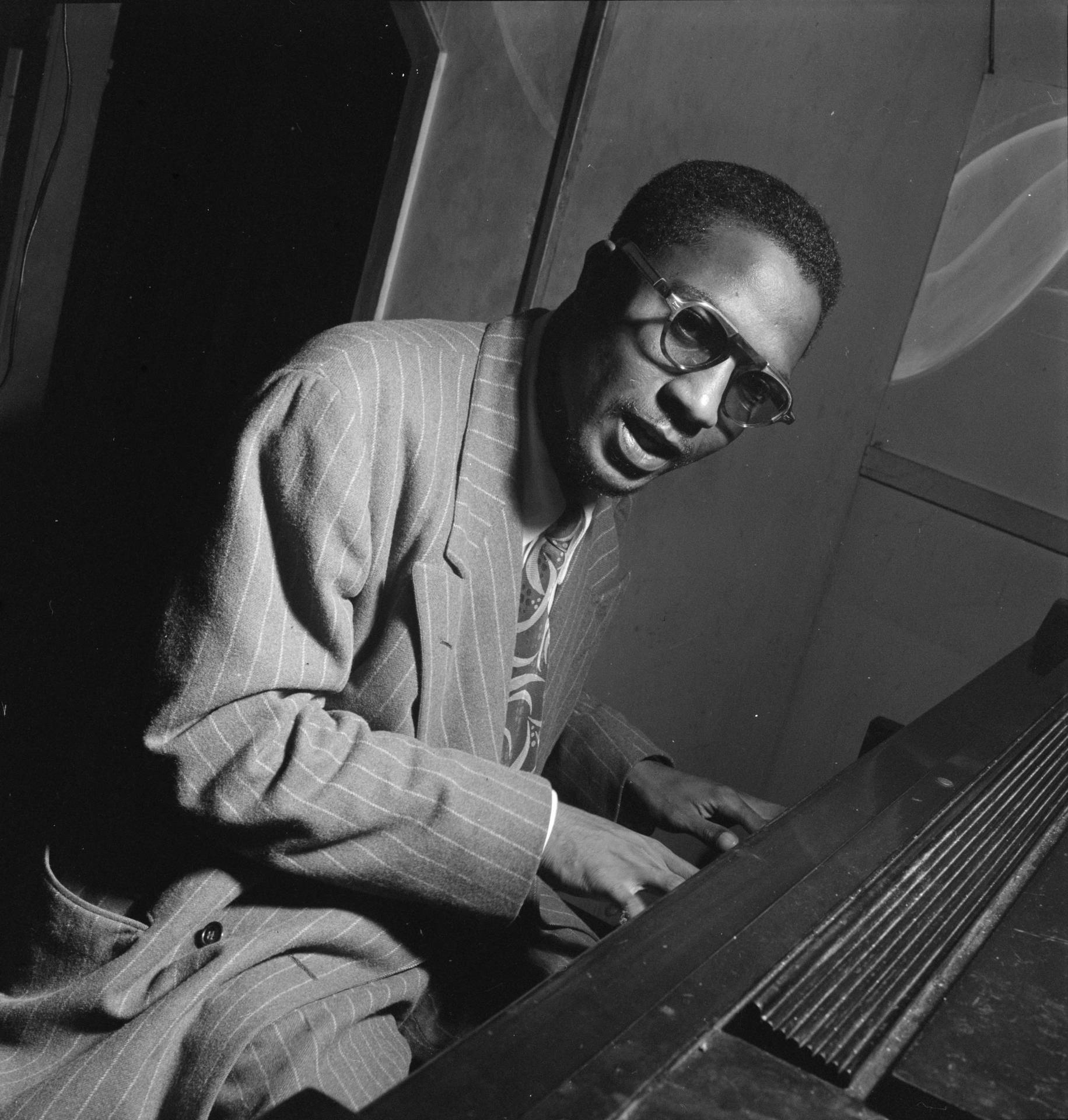 Young Thelonious Monk Playing The Piano Background