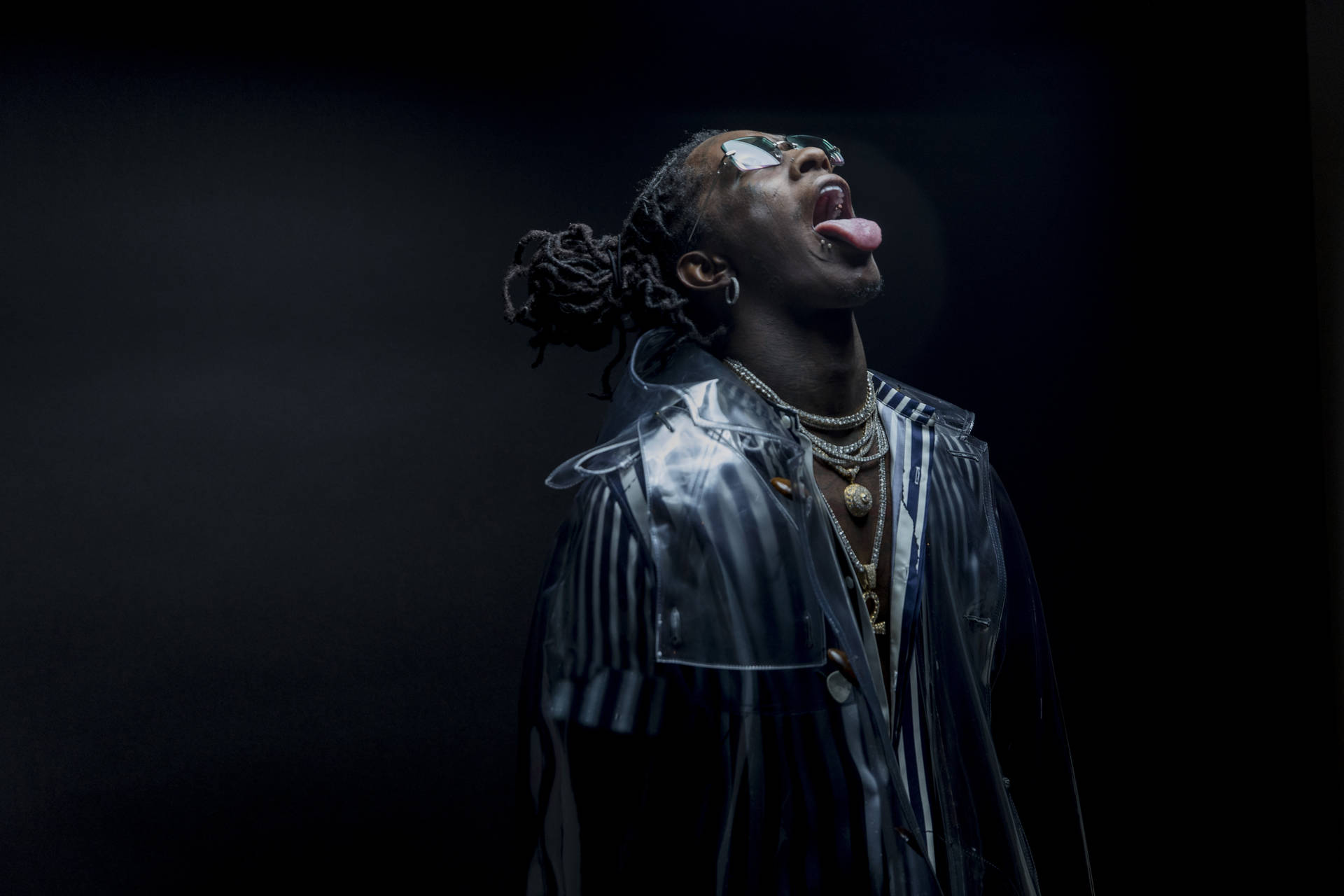 Young Thug Shows Off His Signature Style Background