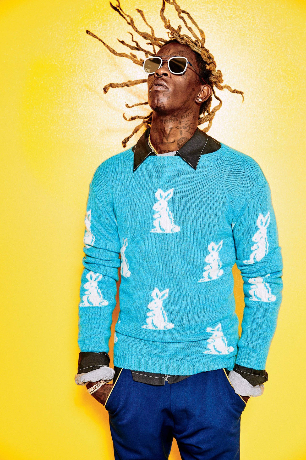 Young Thug Strikes A Confident Pose Background
