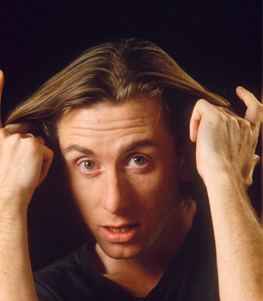 Young Tim Roth Playing With His Hair