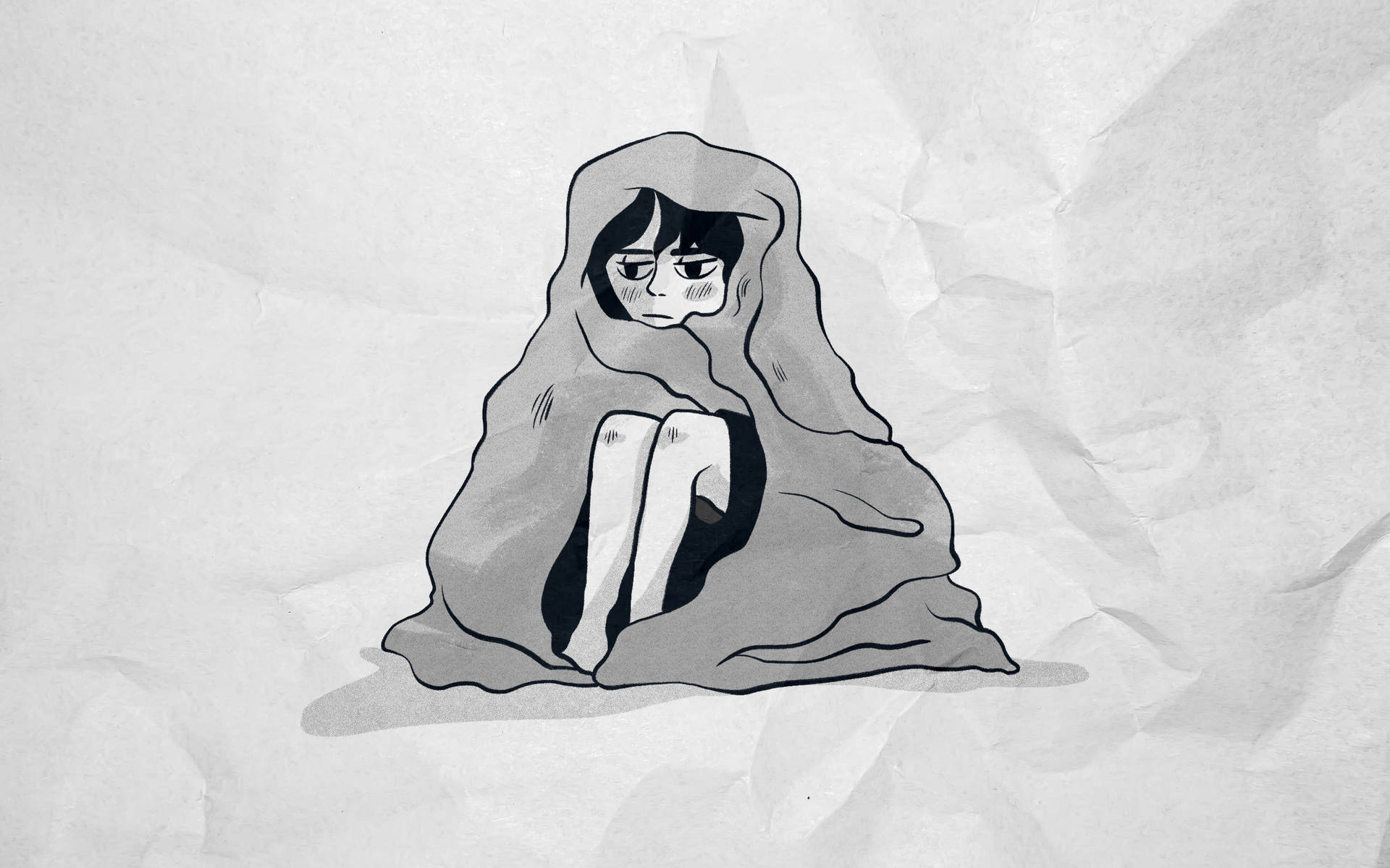 Young Woman Feeling Anxious Wrapped In Blanket